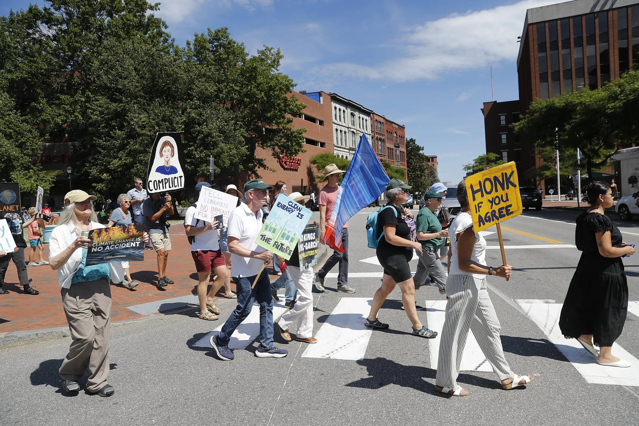 Maine climate protesters oppose legal immunity for fossil fuel industry