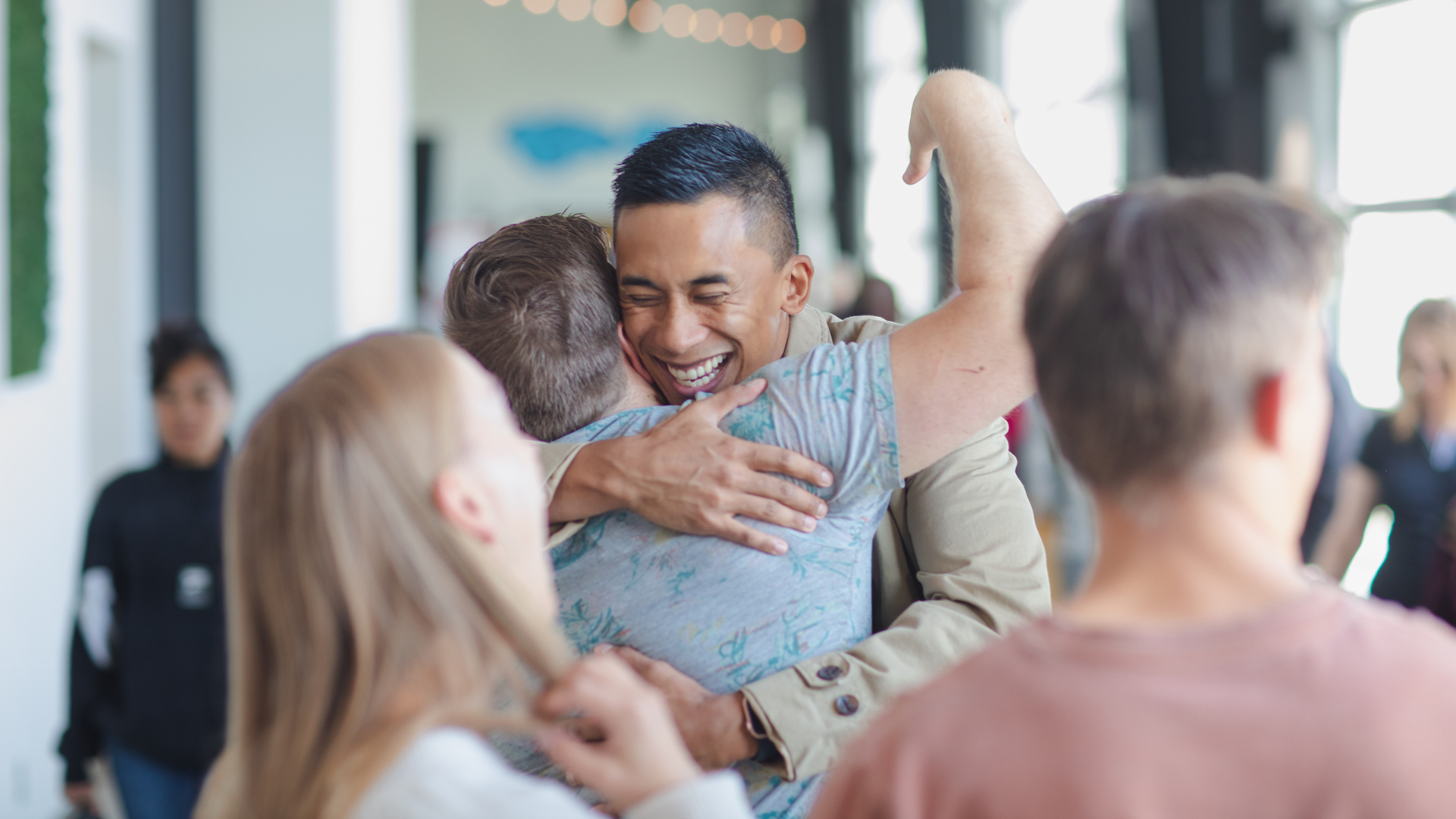 Men hugging at Calgary Life Church