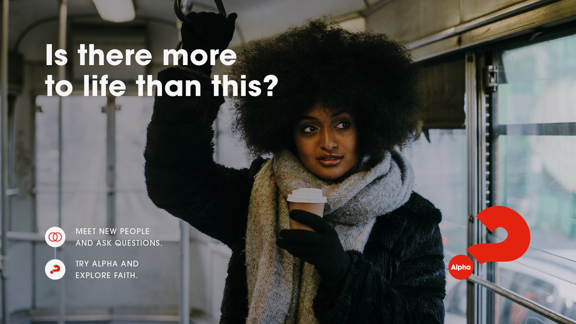 A woman with an afro hairstyle and dark clothing inside a transit vehicle, holding a paper cup, raising her hand, with a large red question mark and the text 'Is there more to life than this?' overlaid on the image.