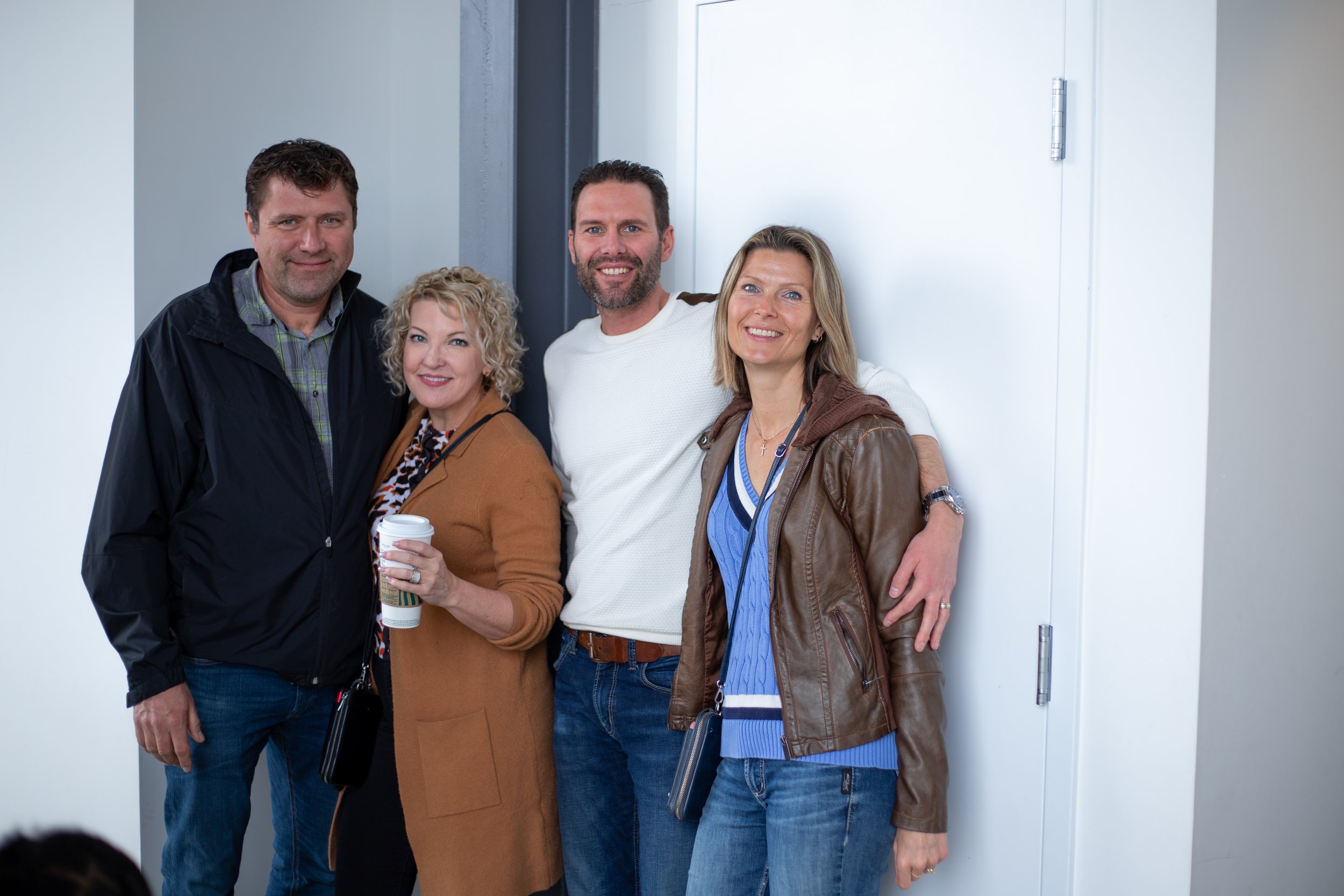 Middle aged people smiling at Calgary Life Church