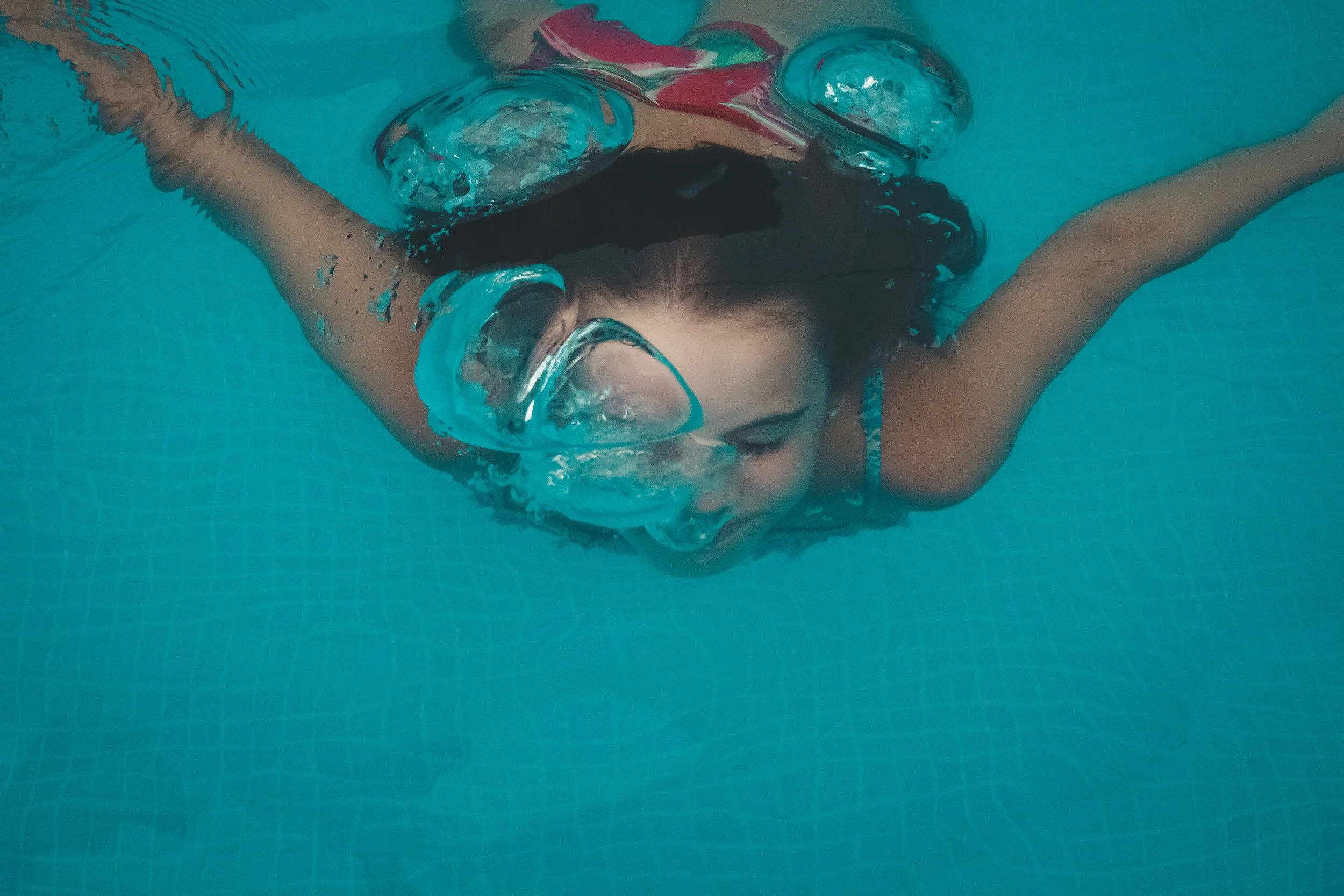young girl swimming