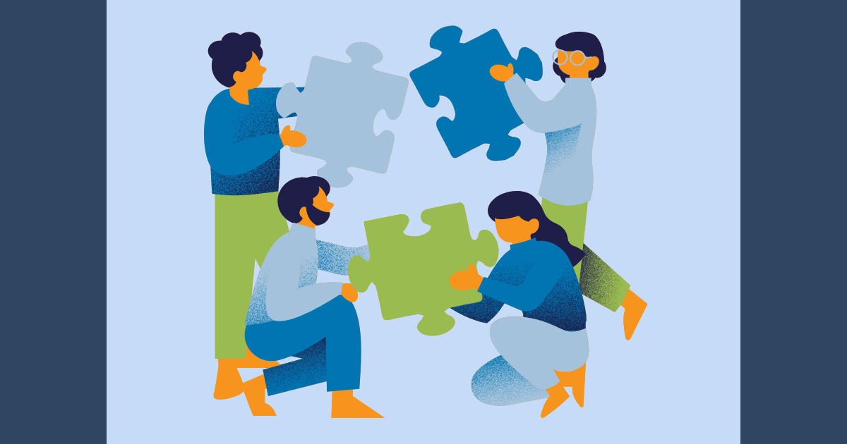 people putting a puzzle together