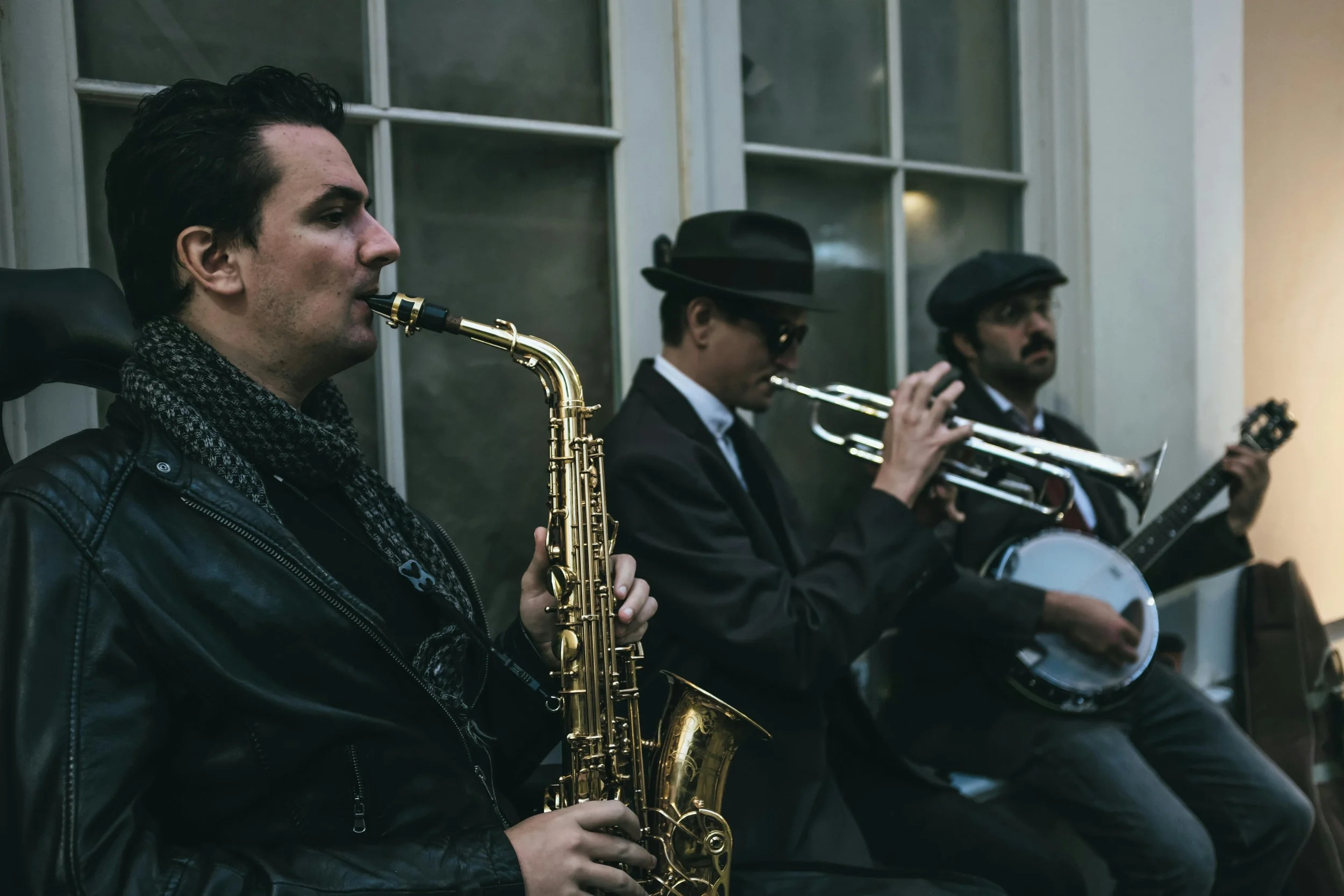 live jazz band for wedding trio performing sax trumpet and banjo