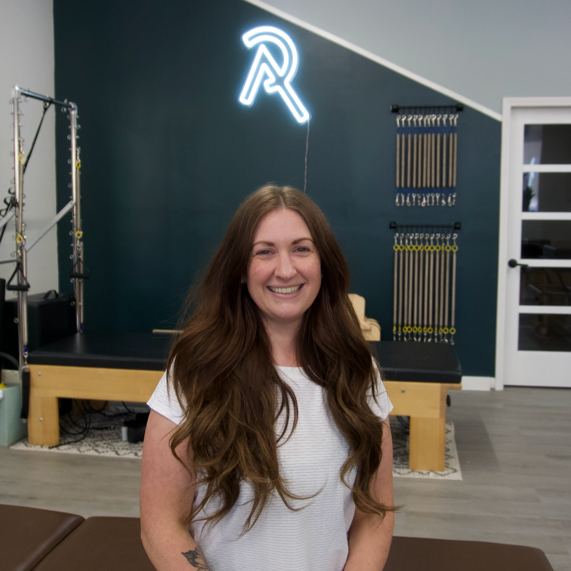 Kaitlyn Vann Bean the founder and owner of Rise smiling.