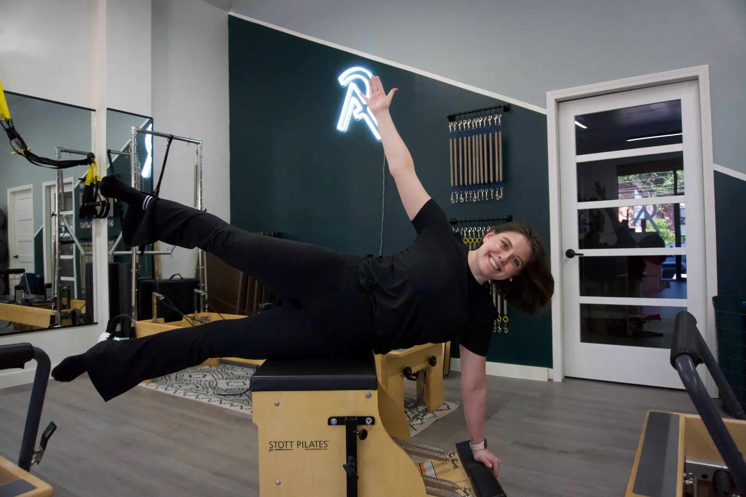 woman working out on Pilates chair