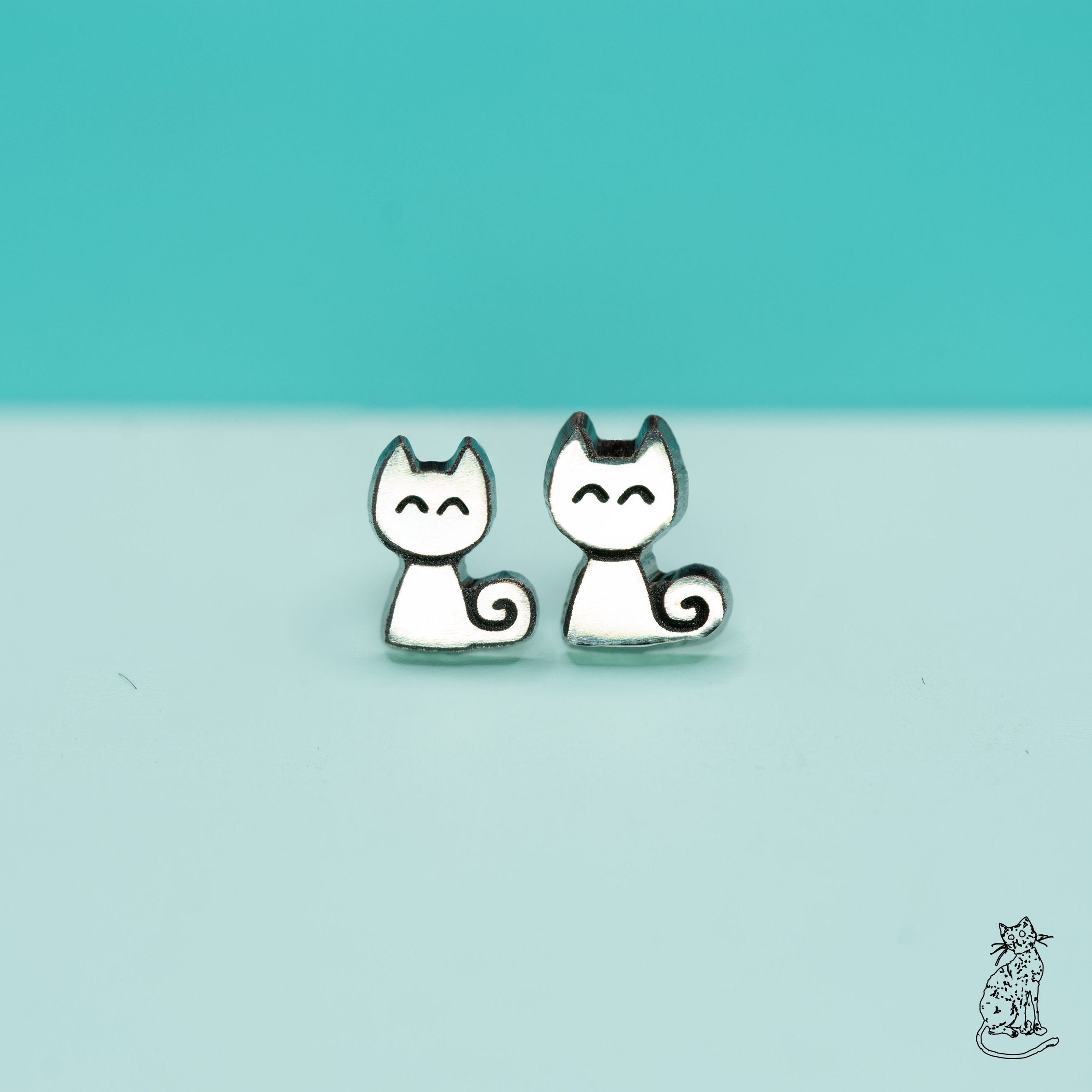 cat curled tail both facing forward_.jpg