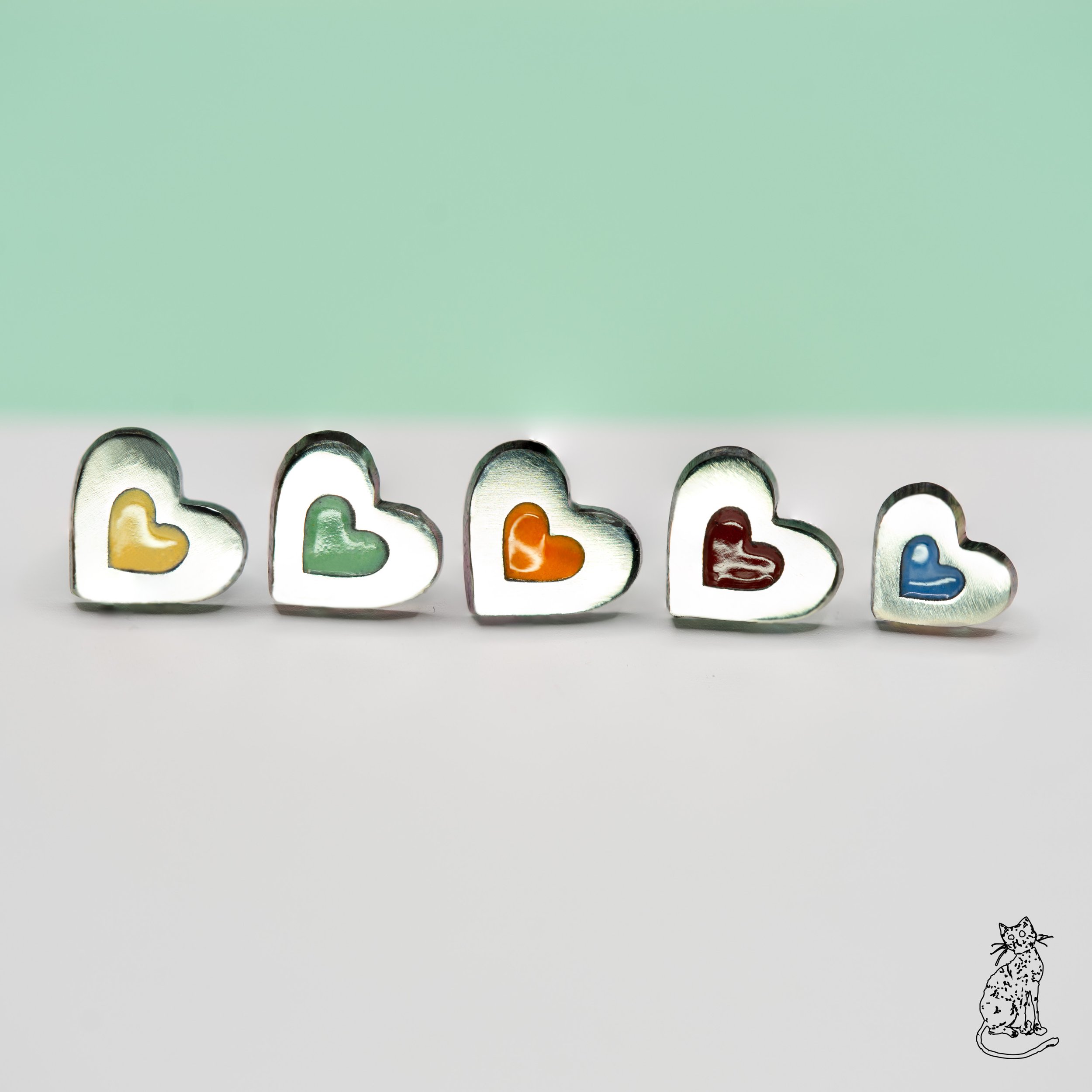 heart within a heart enamel all facing forward.jpg