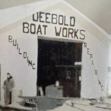 Sign reading 'Uebold Boat Works' with