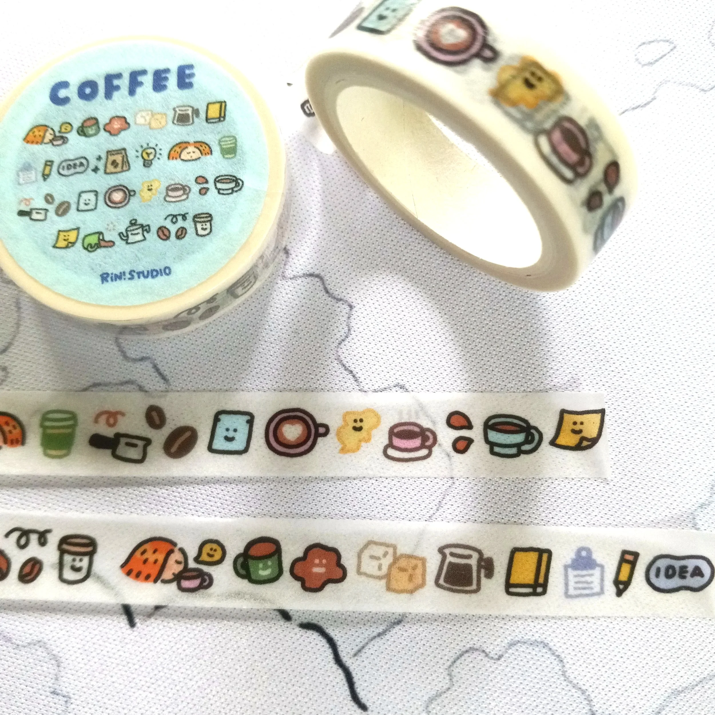 Mini washi tape with cute coffee-themed emoji designs in a playful kawaii aesthetic for stationery and scrapbooking