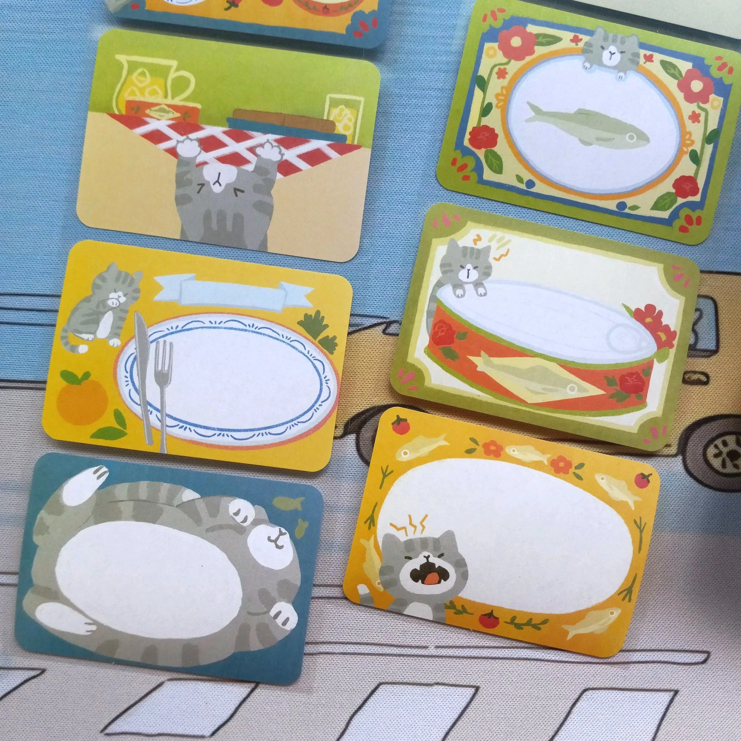 Paper roll label “#1 Sardine Fan” by Thousand Skies featuring charming cats with sardine illustrations