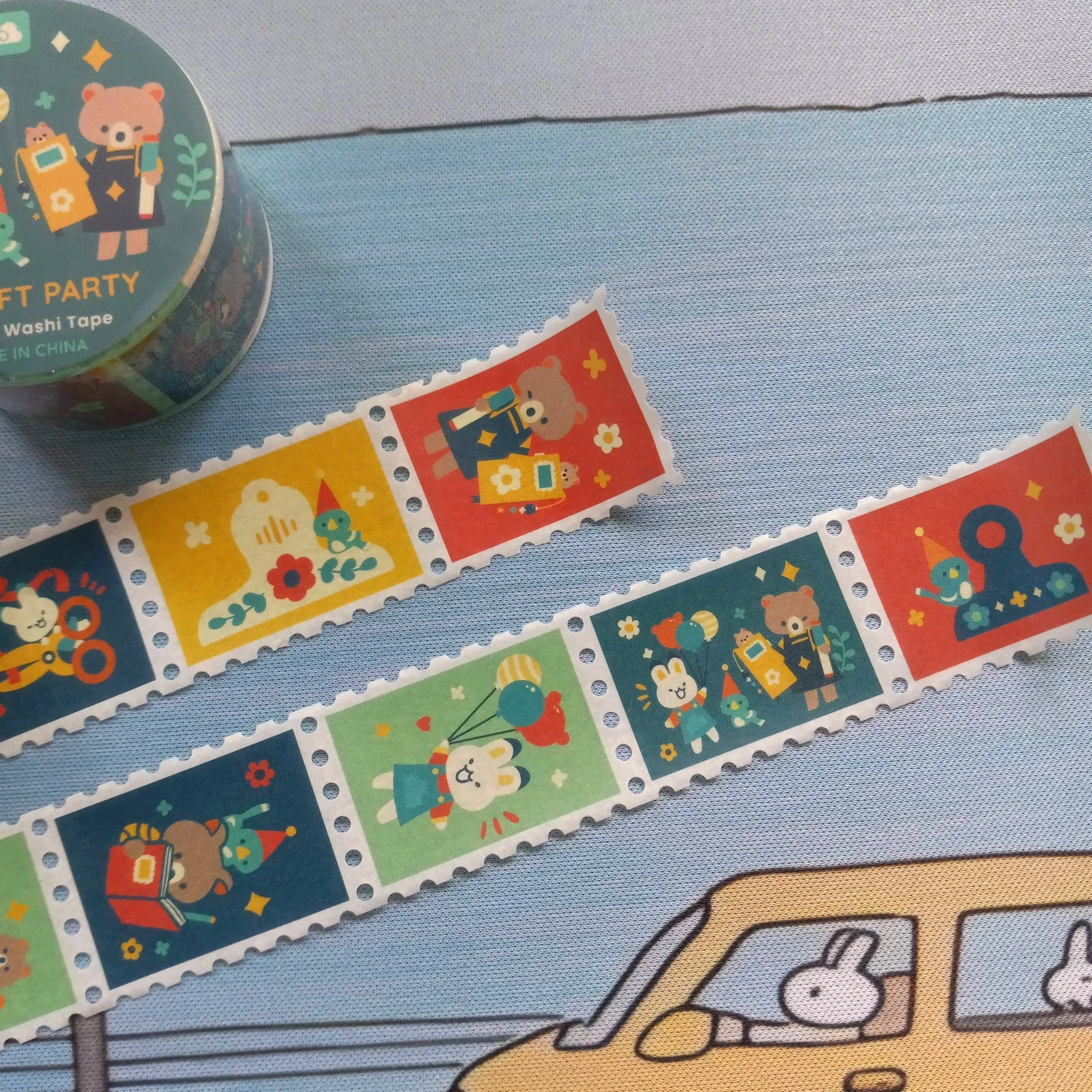 Close-up of stamp washi tape roll “A Craft Party” by Thousand Skies showing illustrated craft-themed designs