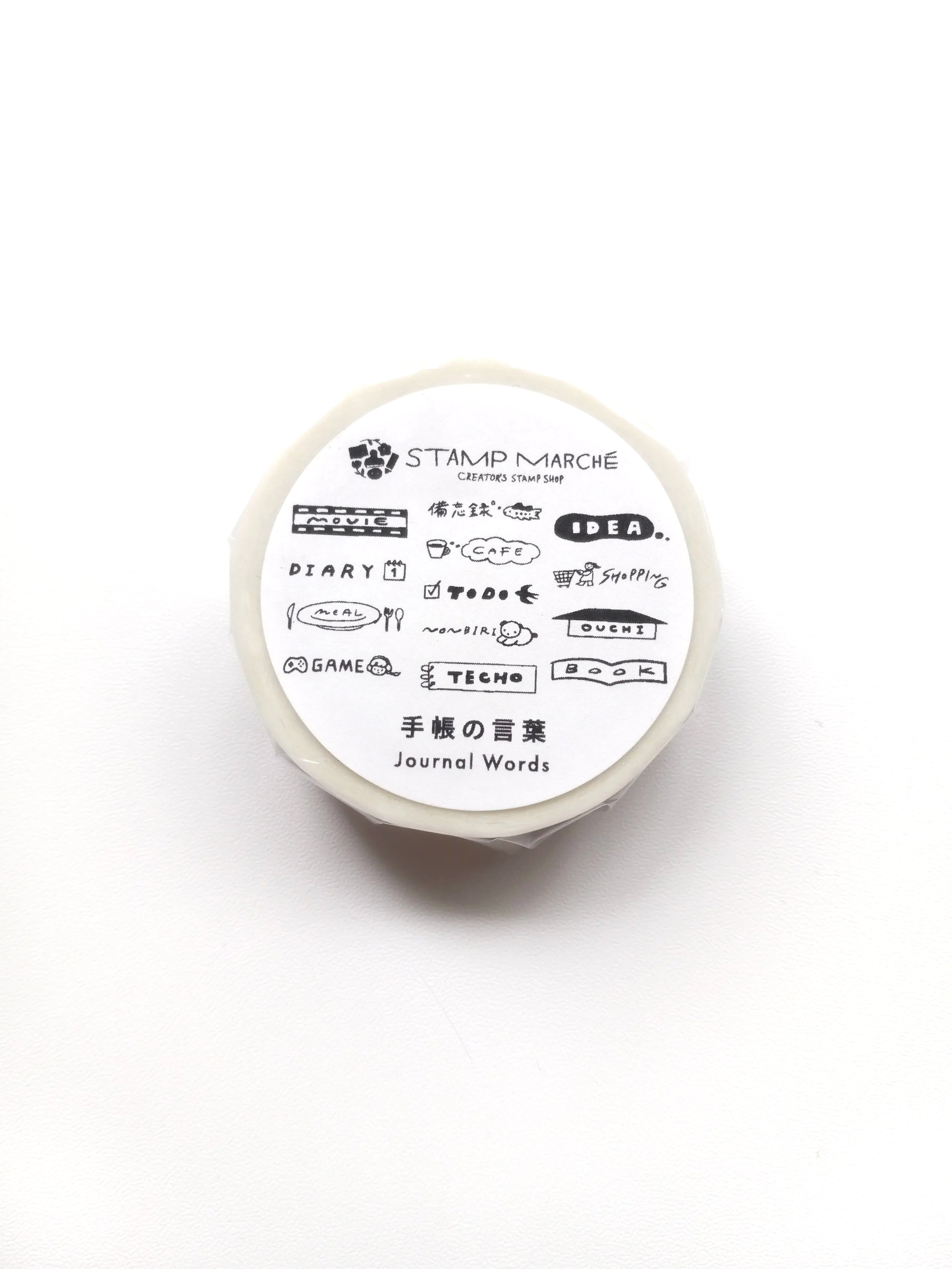 Close-up of Stamp Marche Journal Words washi tape featuring Japanese words and illustrations
