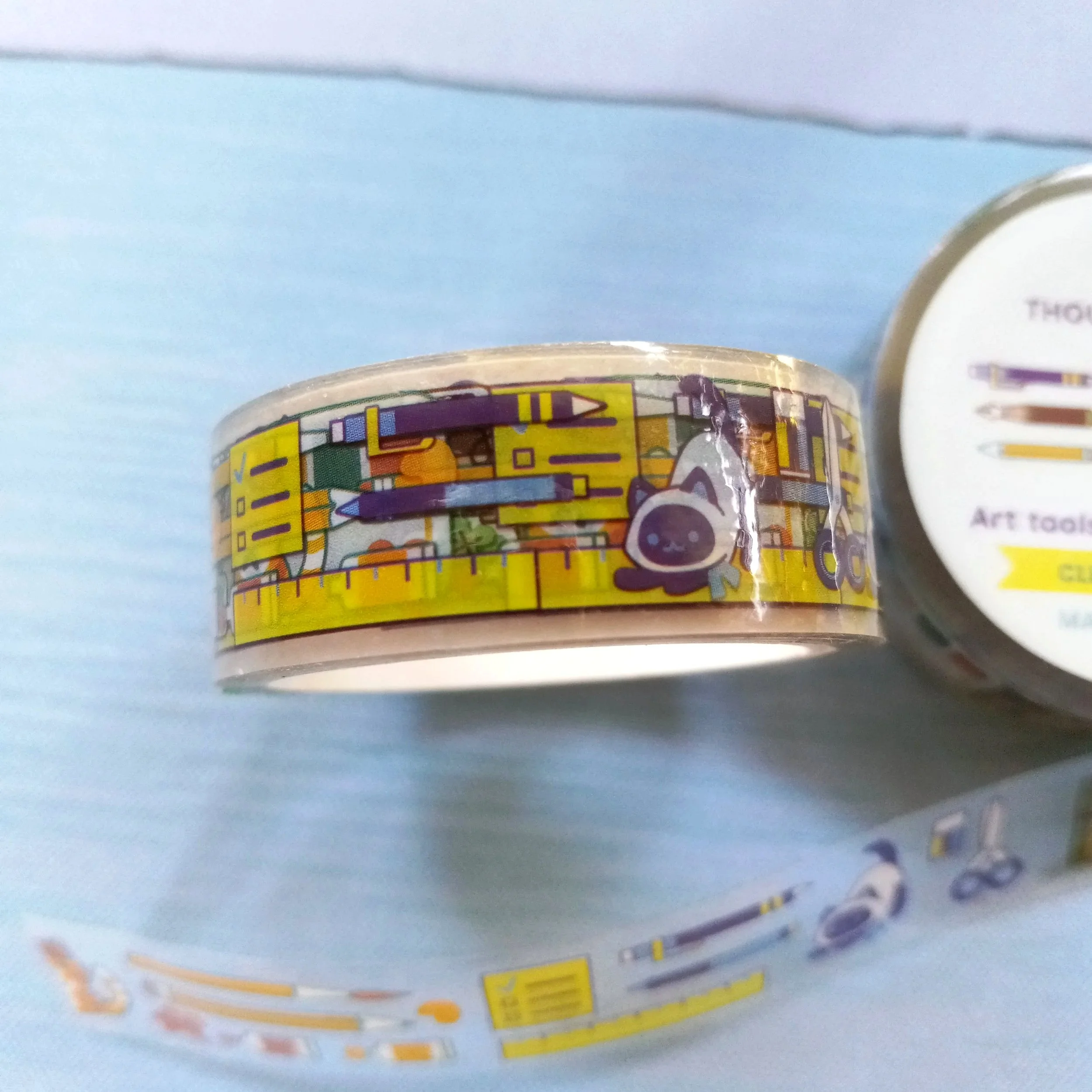 Close-up of cat-themed clear PET tape for journaling