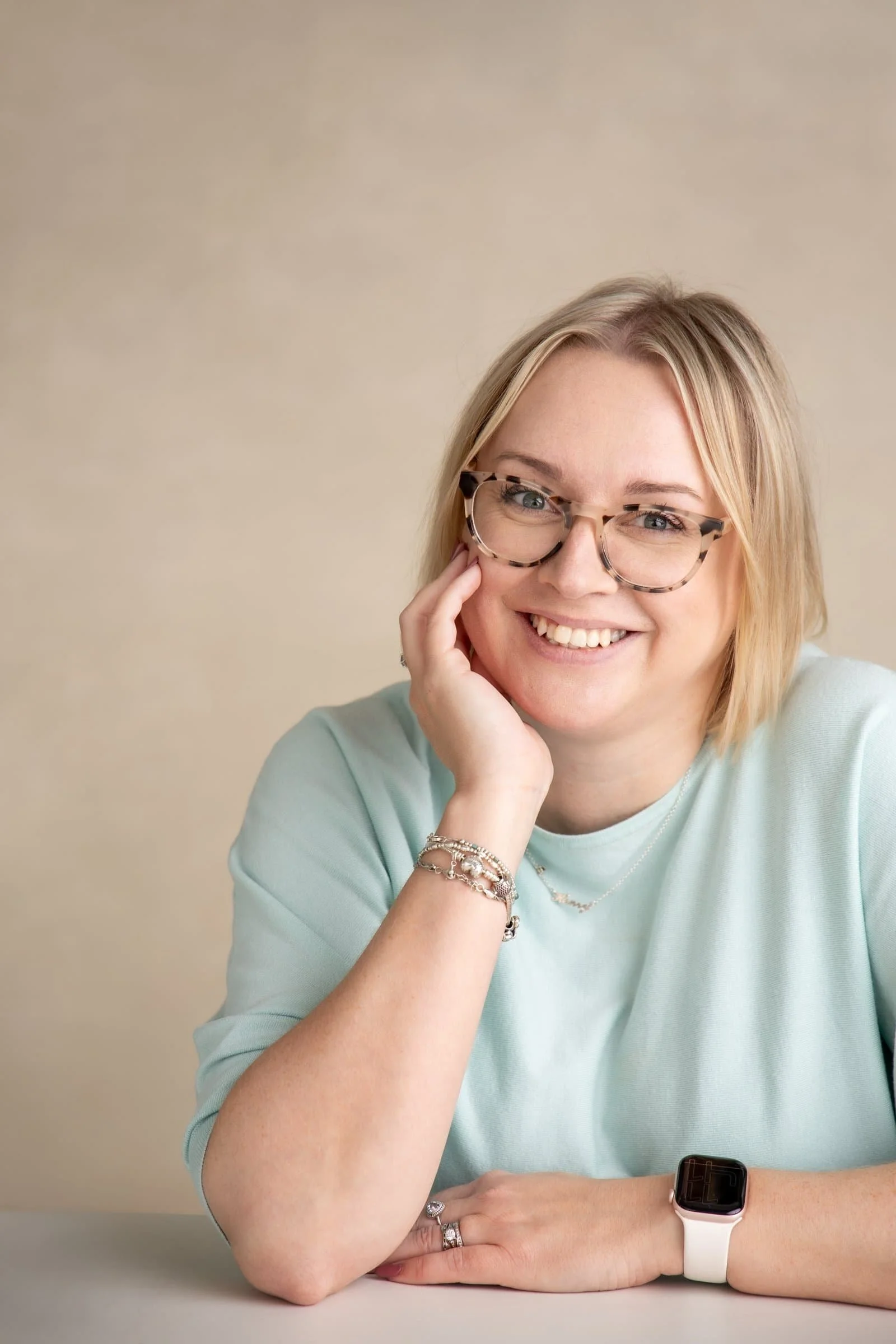 Sadie Finch, virtual assistant, smiling and facing the camera, demonstrating her virtual admin support services for small businesses from her home in Ely, Cambridgeshire