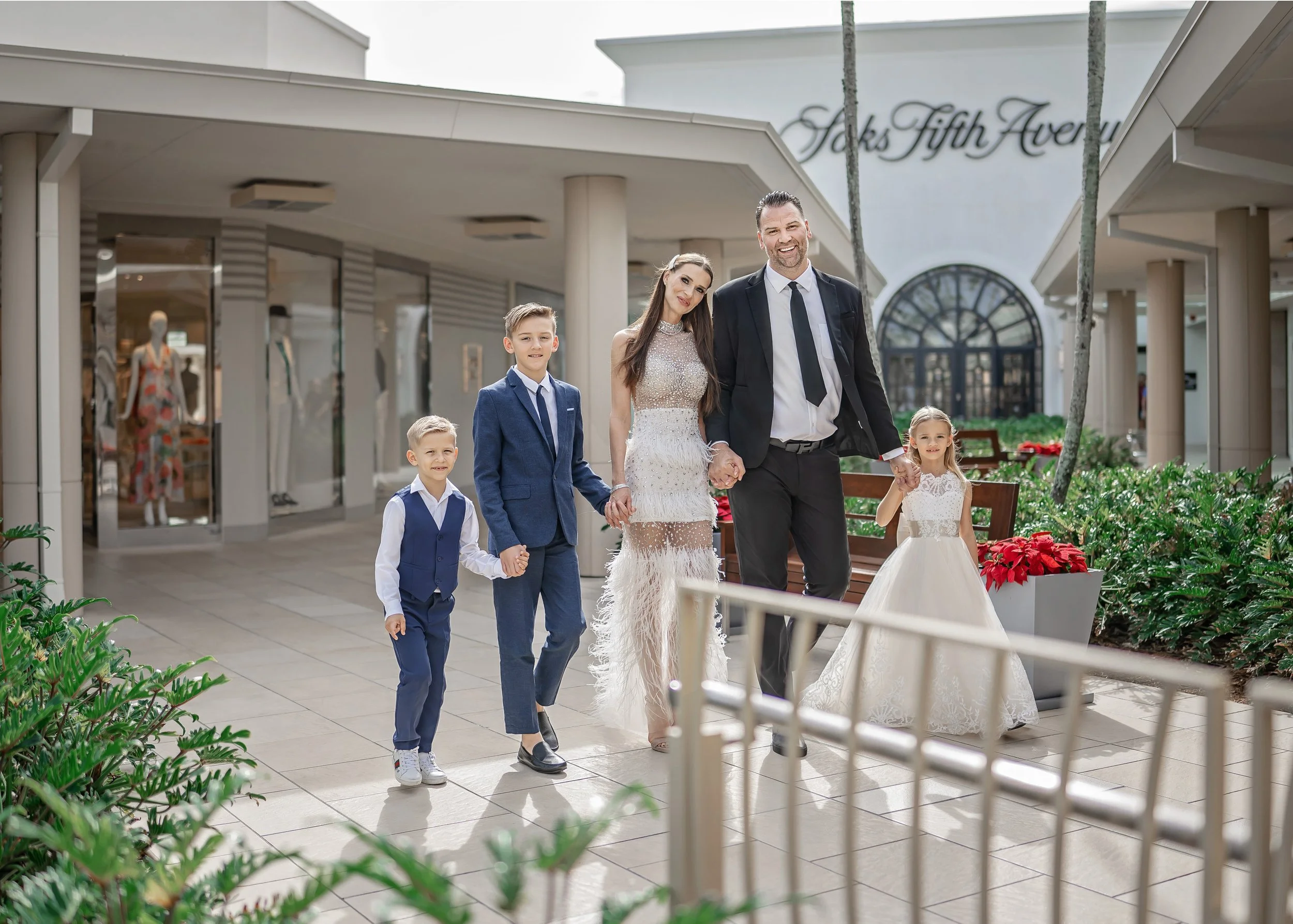 Elevated family imagery blending classic composition with modern refinement.