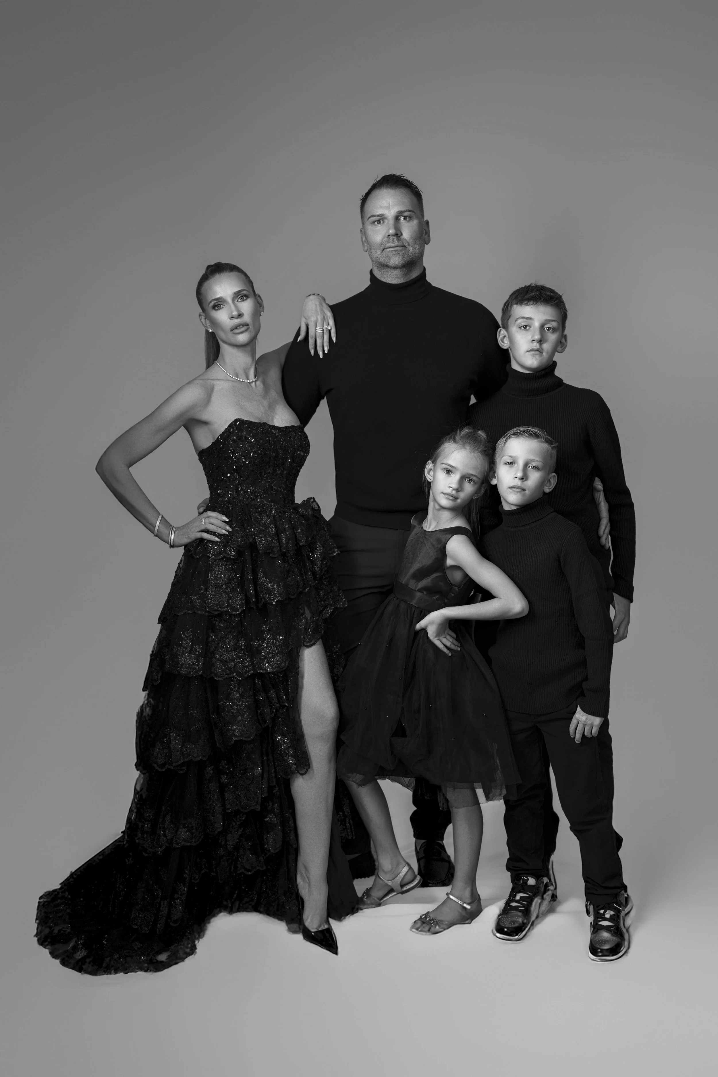 A refined family portrait capturing connection, presence, and effortless elegance.
