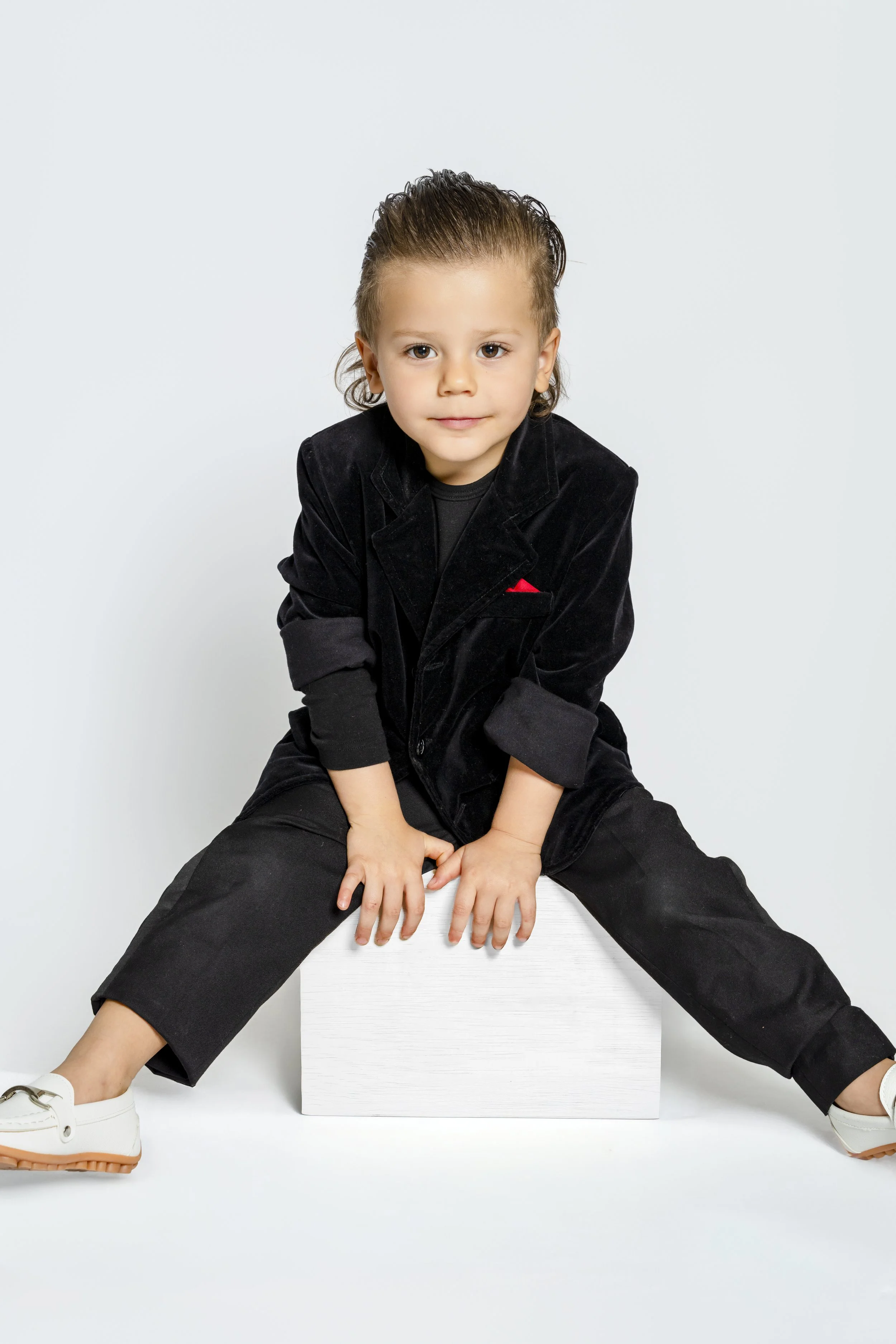 An intimate family portrait styled and composed with editorial precision.