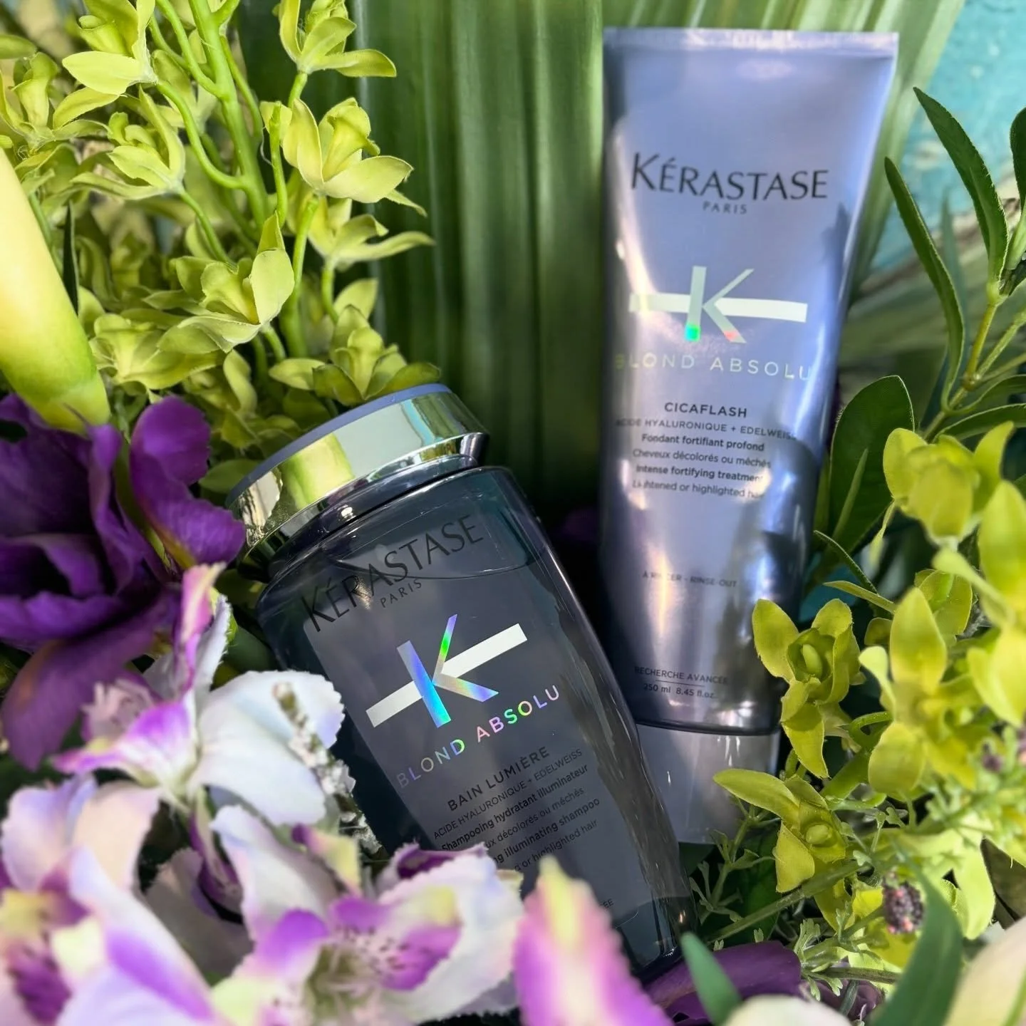 Our favourite&hellip; can you guess? 👀💜 

The Blond Absolu range by K&eacute;rastase - made for luminous blondes 💜

Hydrated and shining brighter than ever ✨ Flowers @floralimageuk 
@kerastase_proclub @kerastase_official #blondabsolu #kerastase #b