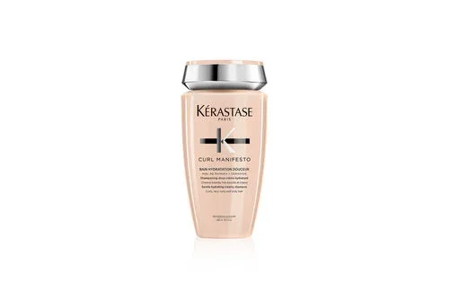 A bottle of Kérastase Curl Manifesto hair treatment