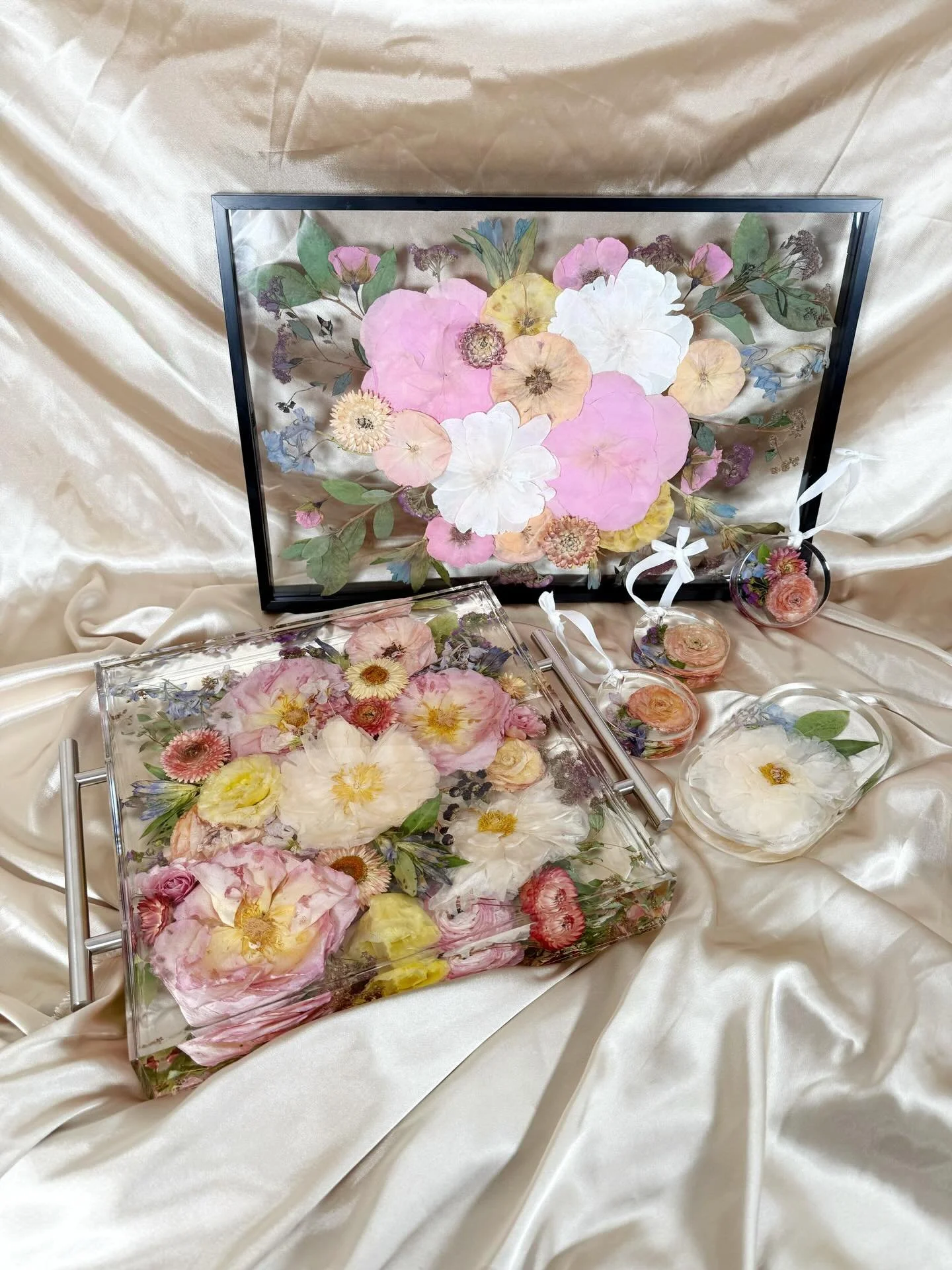 Rylees colorful wedding bouquet preservation 🩷 

12x12 tray
12x18 pressed frame 
3 circle ornaments 
1 oval jewelry dish 

Florist @greengoddessfloral 

#flowerpreservation #weddingbouquet #bridetobe