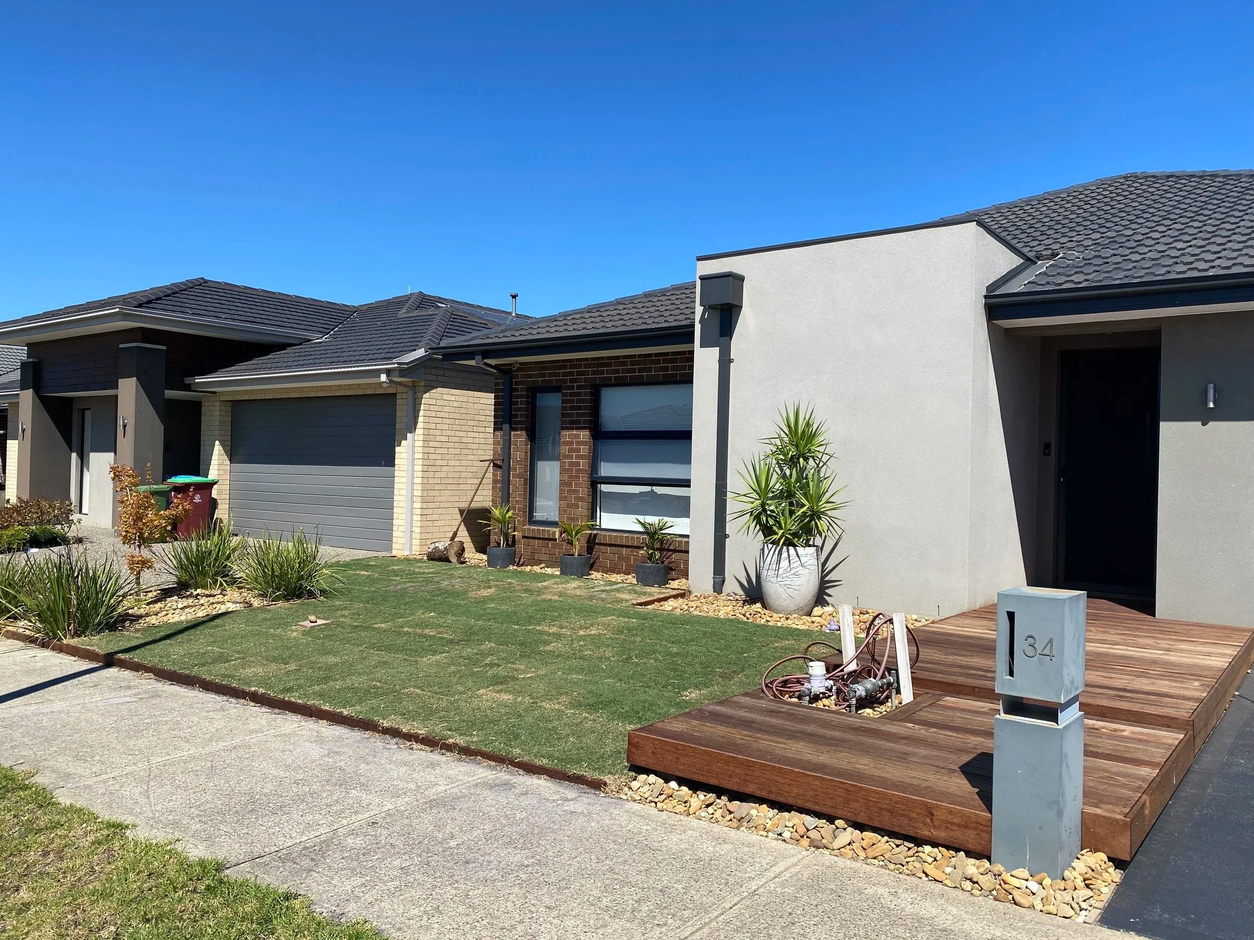 Merbau deck with edging and tiff tuff turf