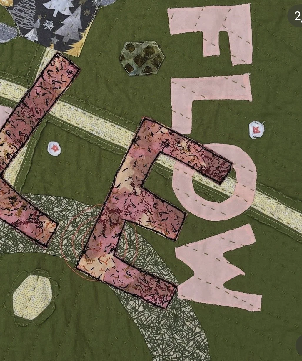 close up of the lower right hand corner showing the word "flow"