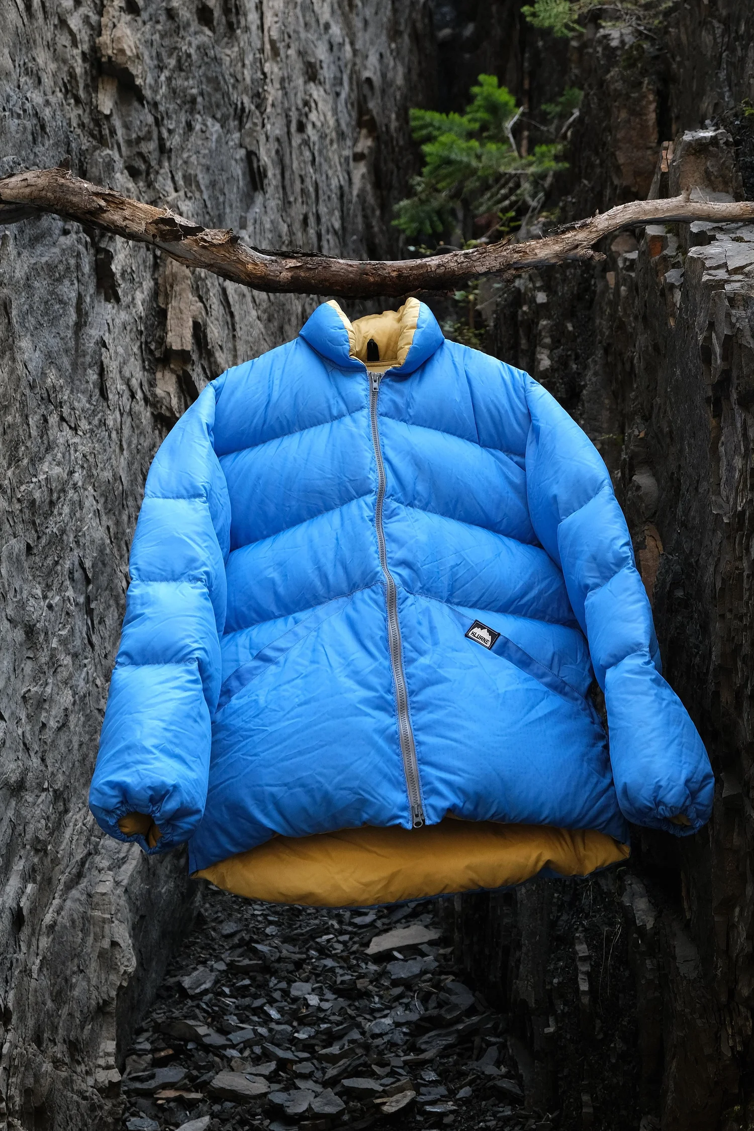 Blue Kluane down jacket photographed in the field