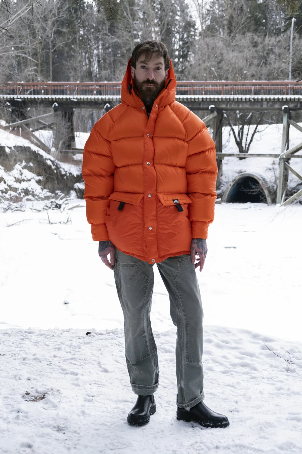 Orange Kluane Outer Parka being worn