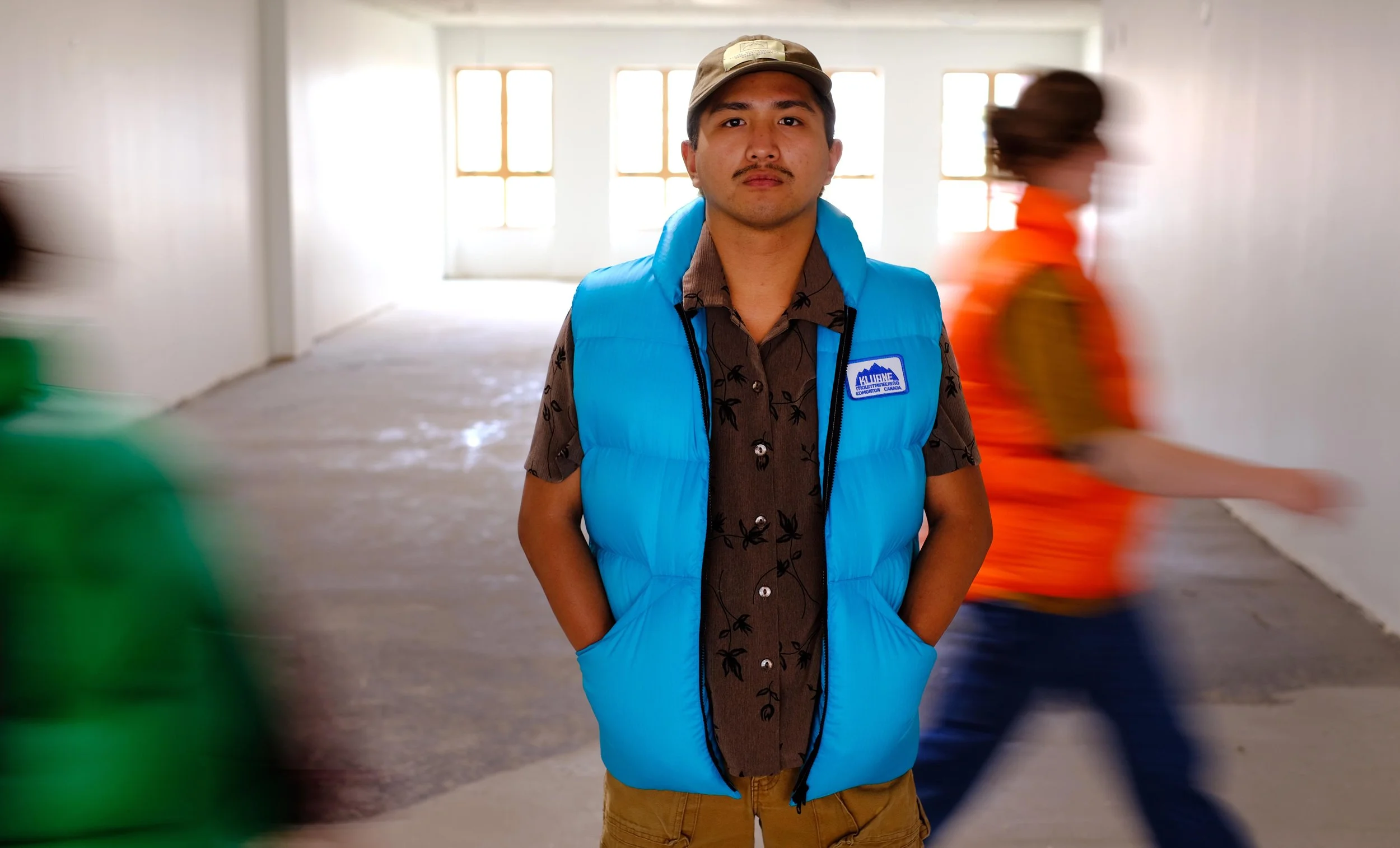 Blue Kluane Down Vest with models