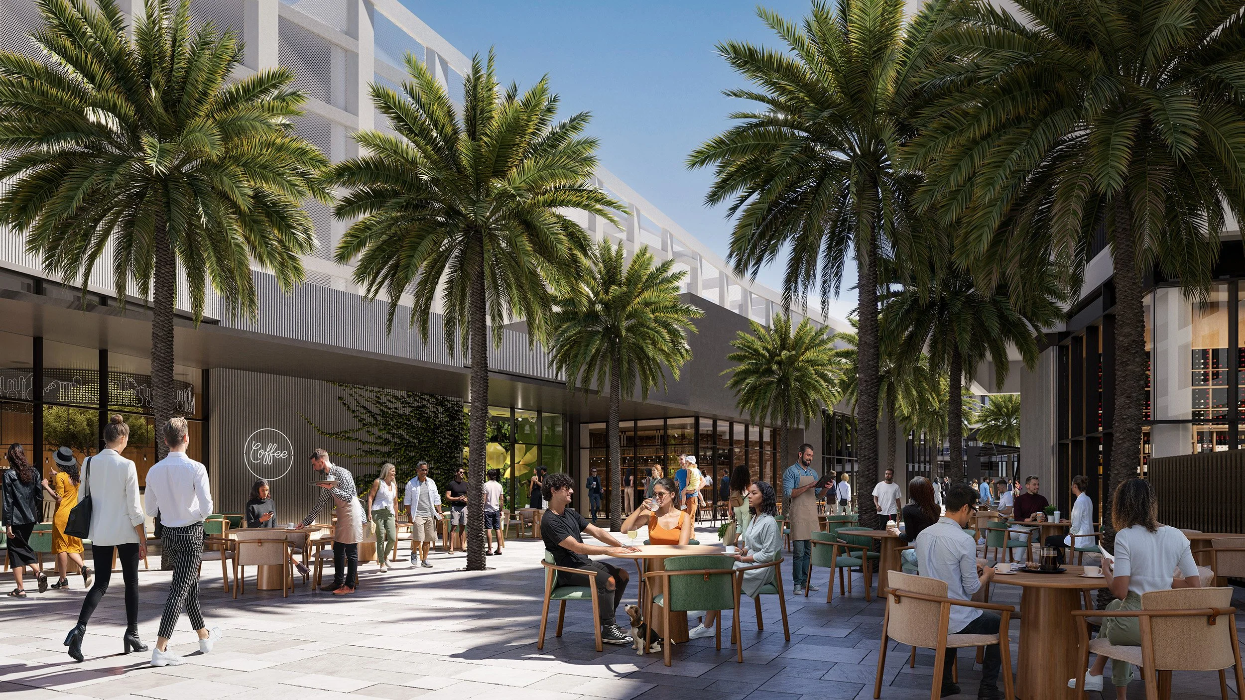 An outdoor coffee shop seating area with palm trees, modern buildings, and people sitting and walking around