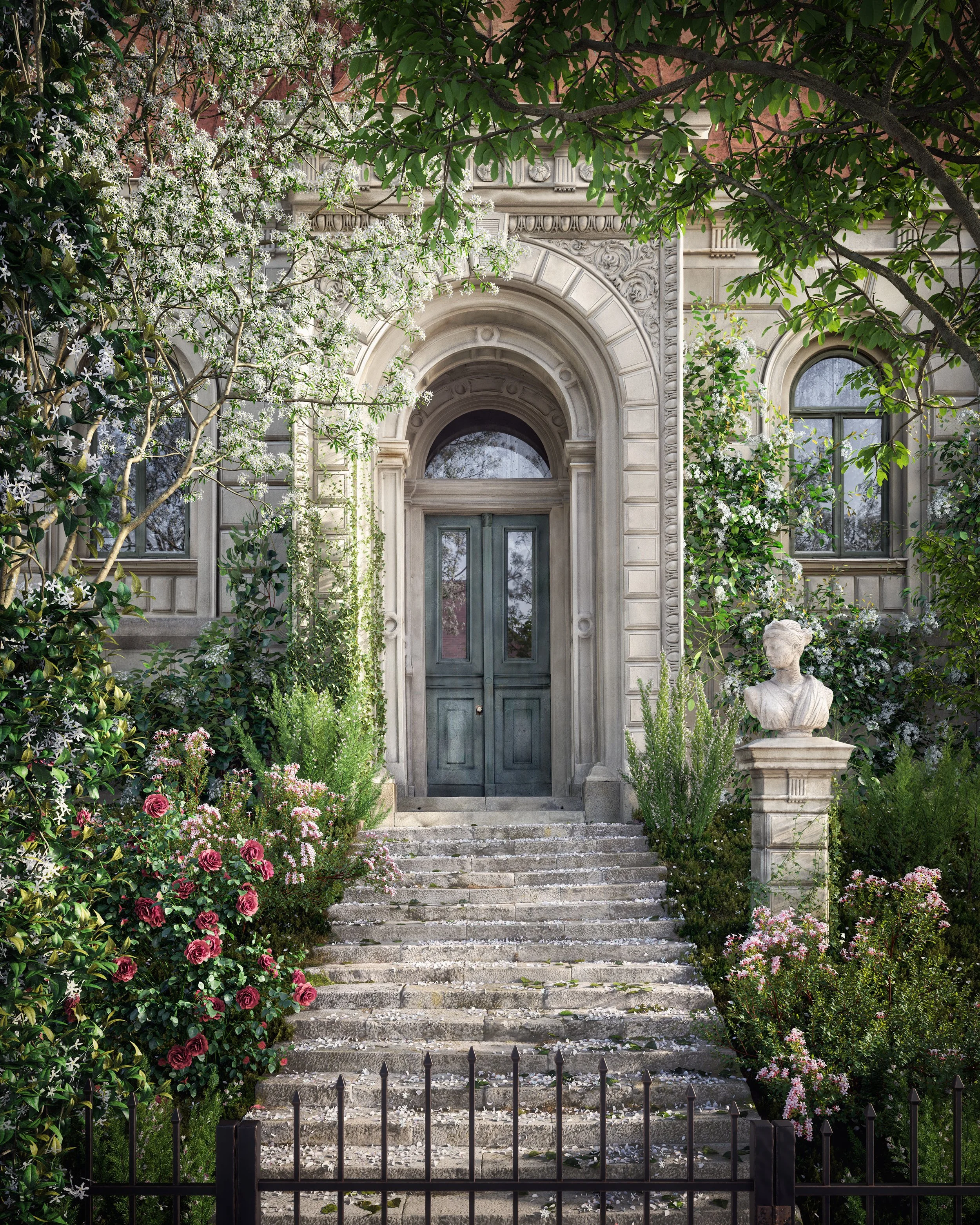 Front porch of a historical building with stone stairs, surrounded by flowering bushes and greenery, a bust statue on a pedestal to the right, and brown framed windows.