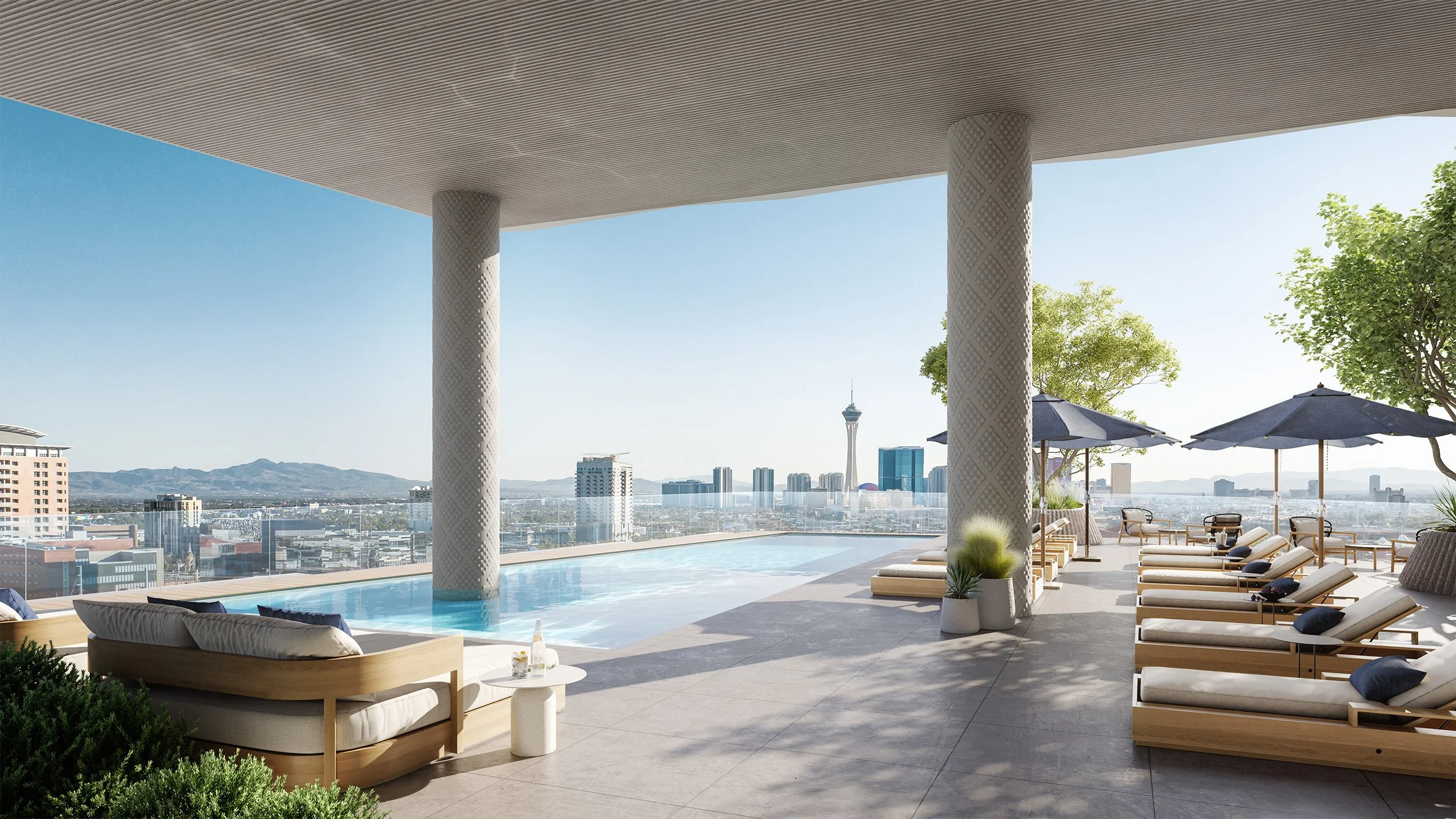 Luxury outdoor pool deck with lounge chairs, umbrellas, and city skyline view, including a tower.