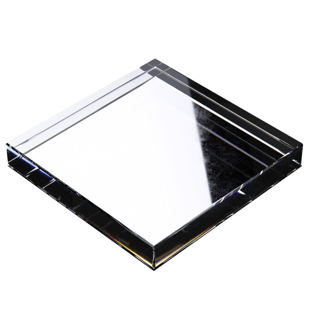 A square crystal or glass tray with polished edges and a reflective surface, placed on a white background.