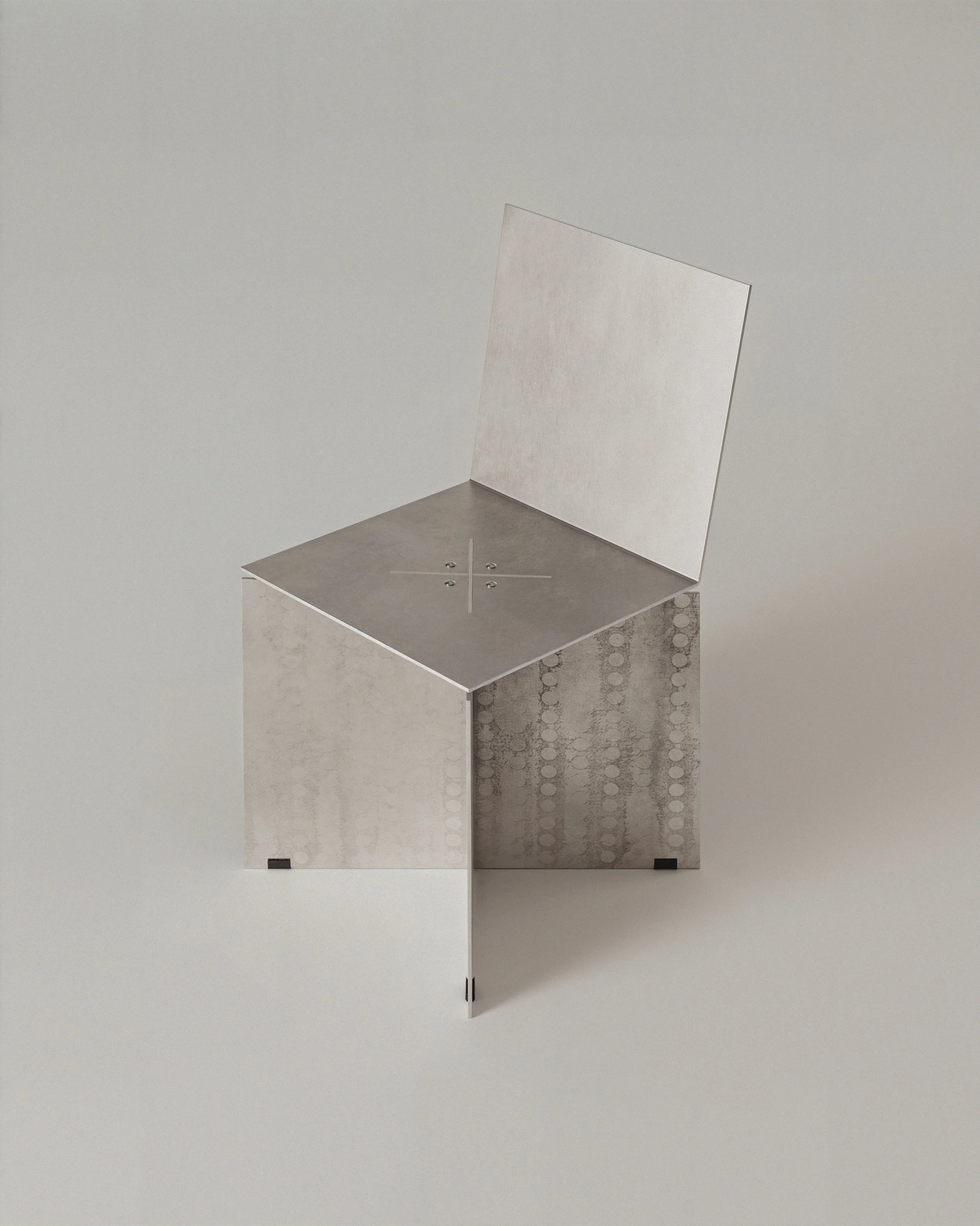 The image shows a metallic chair with a geometric design, featuring a square seat and backrest. The chair has a modern, minimalist aesthetic with a metallic finish and a pattern on the backrest.