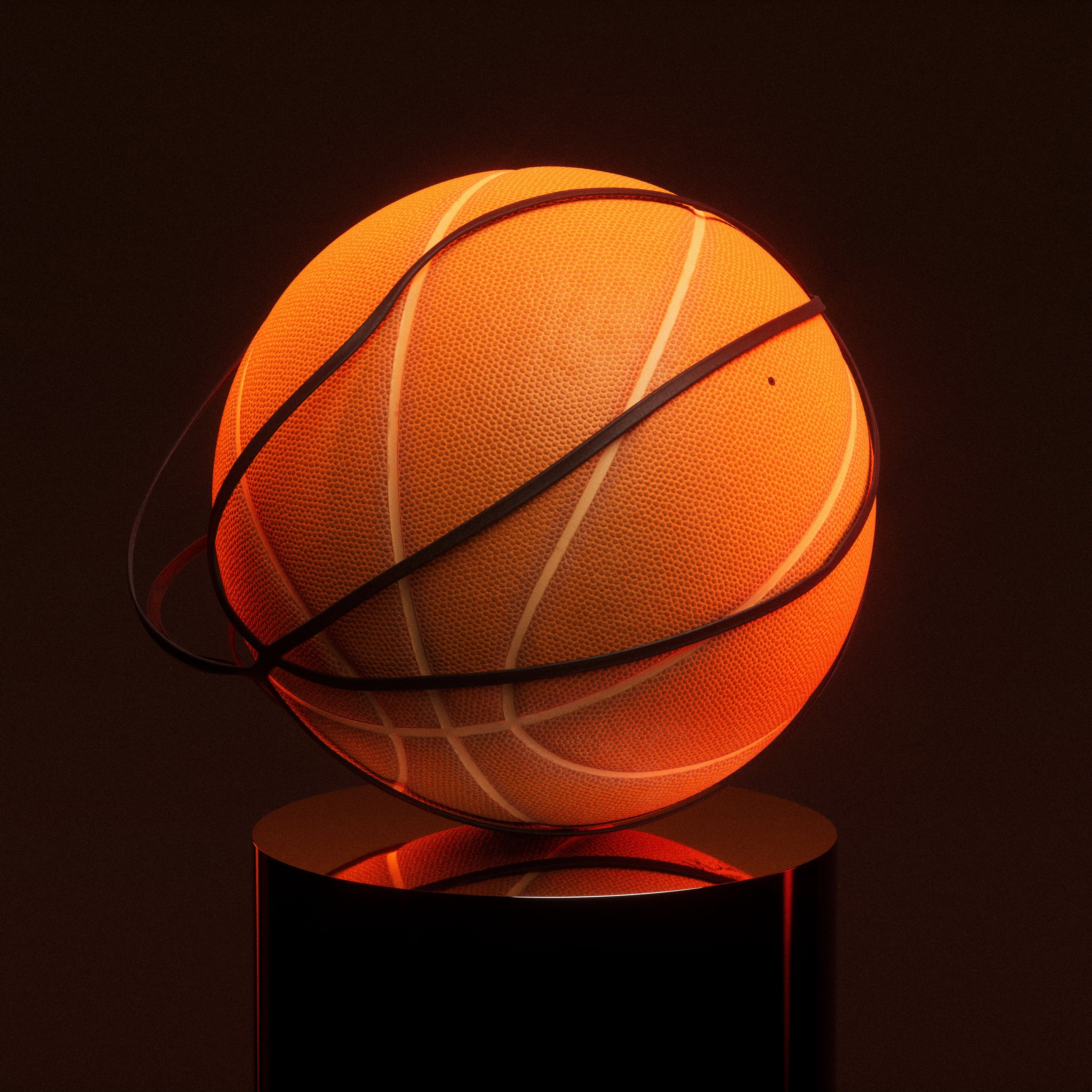 A basketball rests on a minimalist pedestal, illuminated from below to create a warm glow and accentuate the texture and form of the ball.