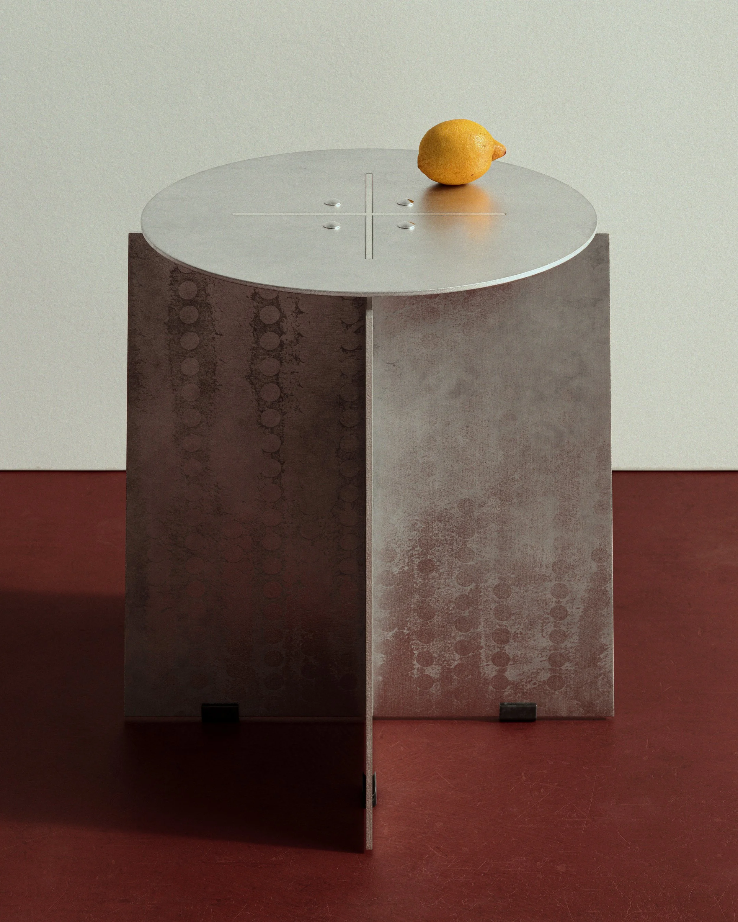 Minimal sculptural side table with a circular metal top and intersecting textured panels, styled with a single lemon against a muted architectural backdrop.