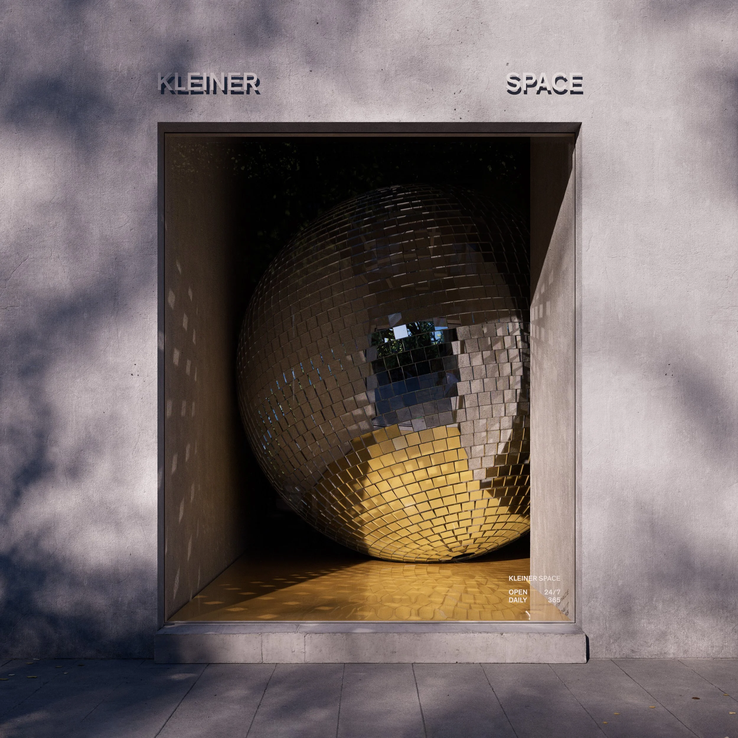 An art installation featuring a large, reflective disco ball inside a concrete window frame, with shadows of trees cast on the wall.