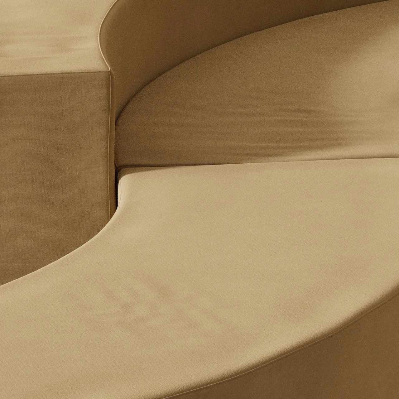 Close-up of a modern beige sofa with curvy design and matching cushions.