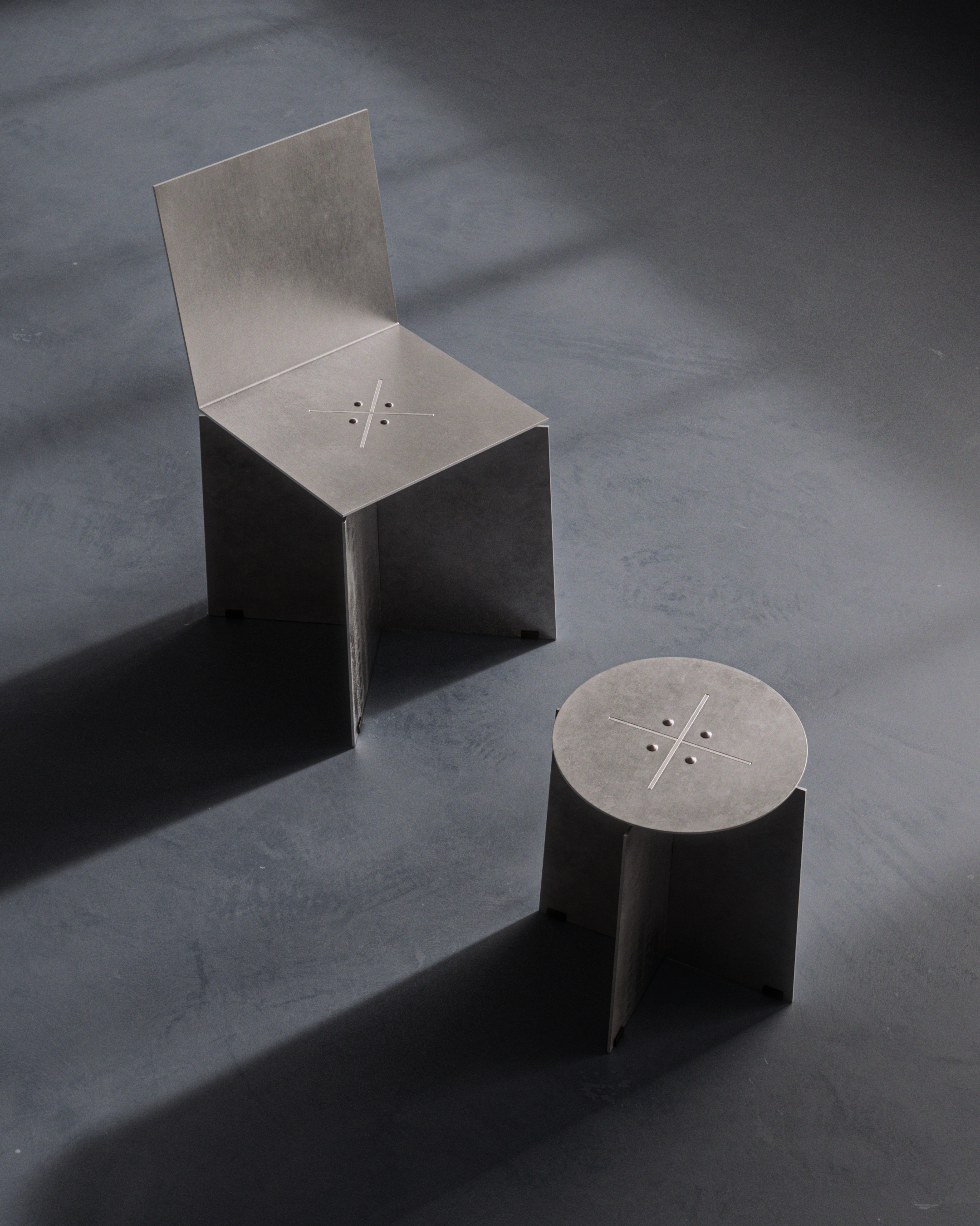 Modern minimalist metal table and chair with circular and square tops, featuring cross and hole cutouts, casting shadows on a concrete floor.