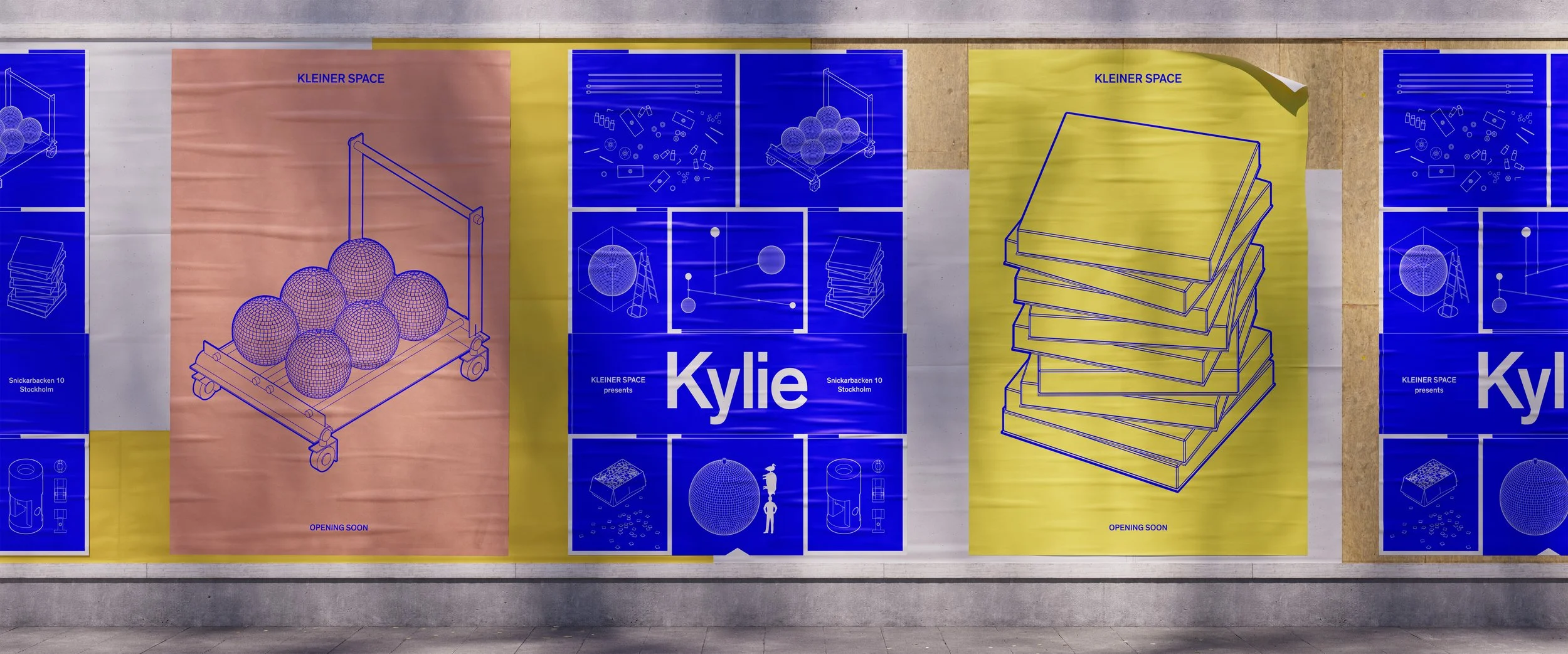 Three large posters on a wall advertising an upcoming event called Kylie at Kleiner Space, Stockholm. The first poster, on the left, features a wireframe illustration of a cart with six spherical objects, with the text 'OPENING SOON' below. The middle poster has the name 'Kylie' and various scientific or schematic illustrations. The third poster, on the right, shows a wireframe of a stack of rectangular sheets, with the text 'OPENING SOON' below.
