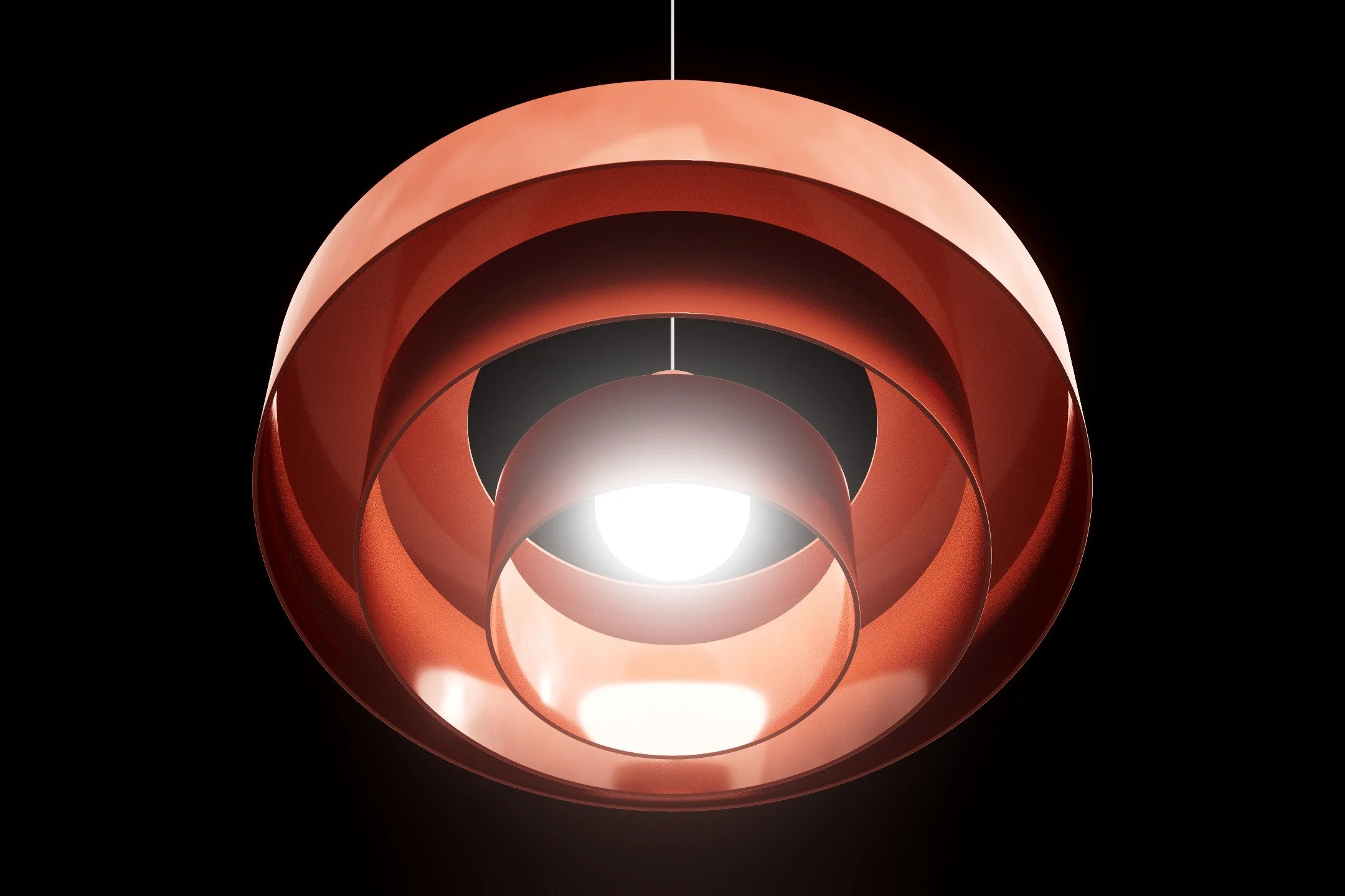 A modern pendant light fixture with concentric rings made of copper, hanging against a black background, illuminated from within.