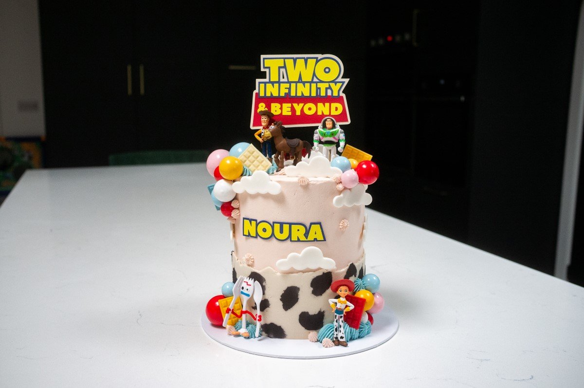 Pink Toy Story themed birthday cake
