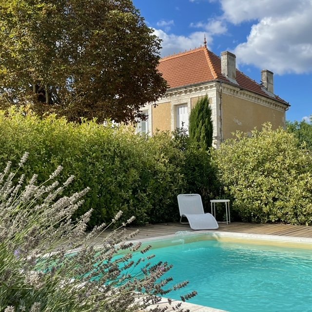 Pool with house in background 2024.jpg