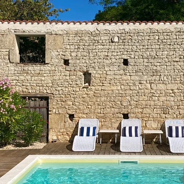 Pool with chaise lounges .JPG