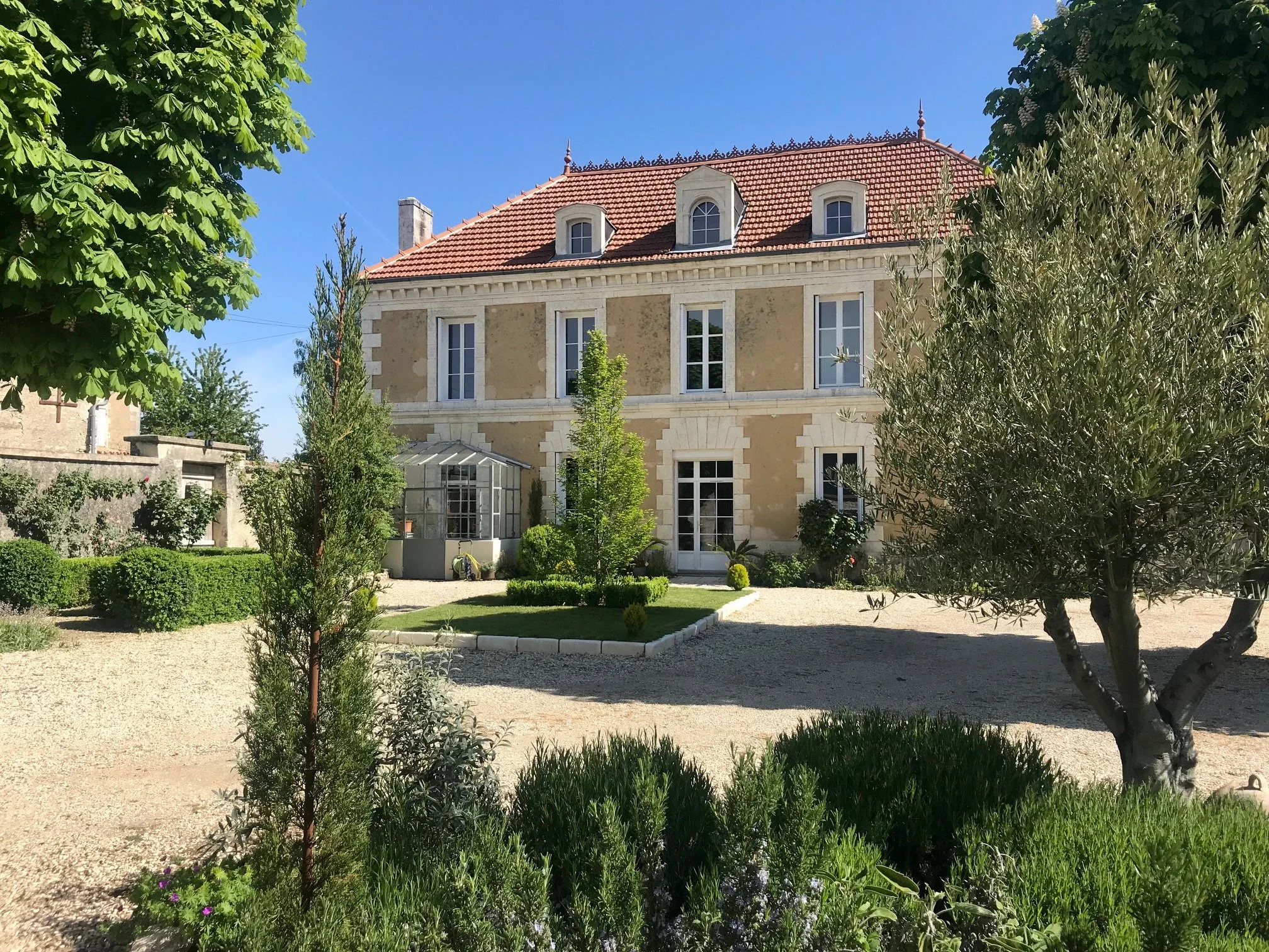 Genac front of house and courtyard.jpg