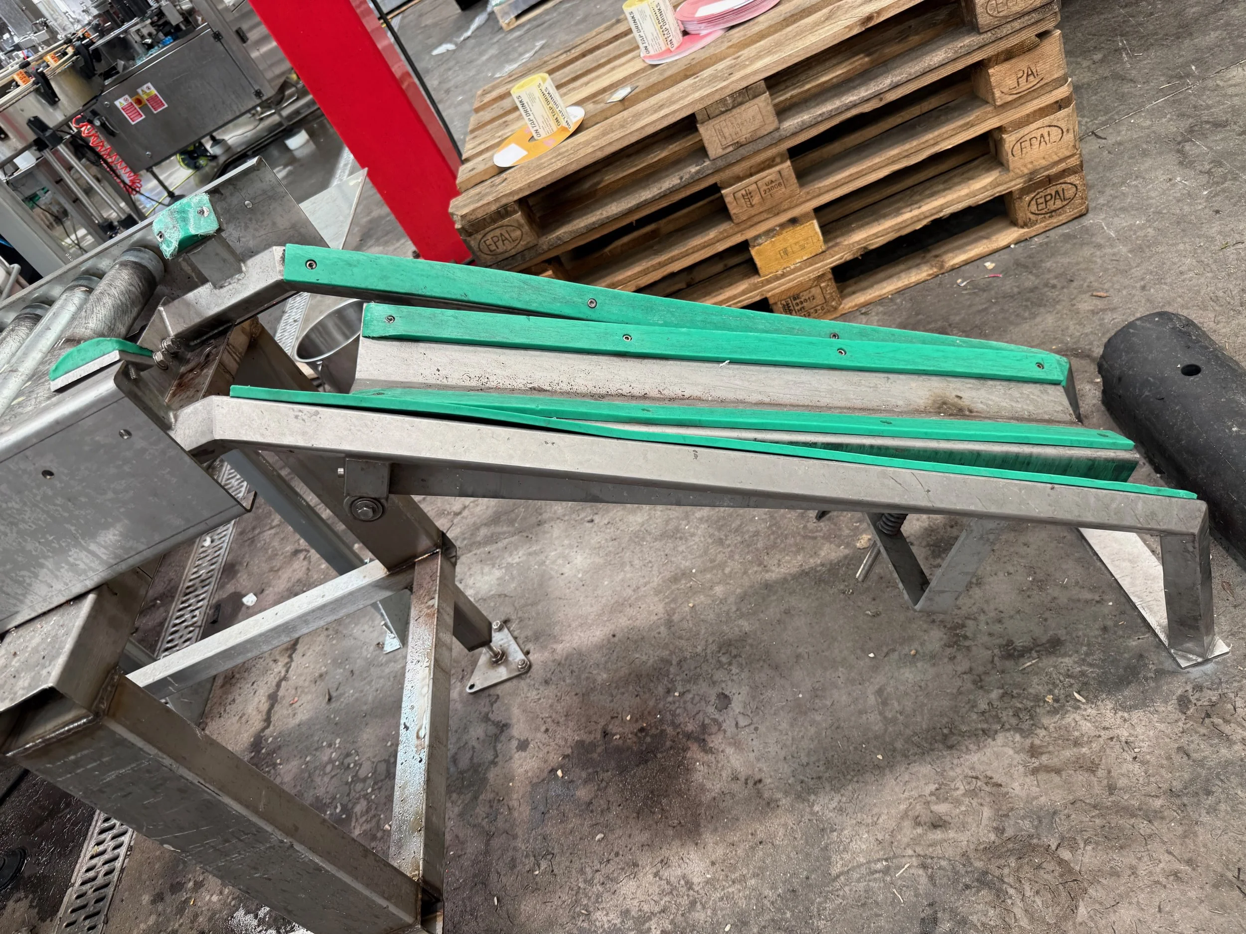 A lining placed on a metal chute to reduce impact noise of metal kegs hitting it