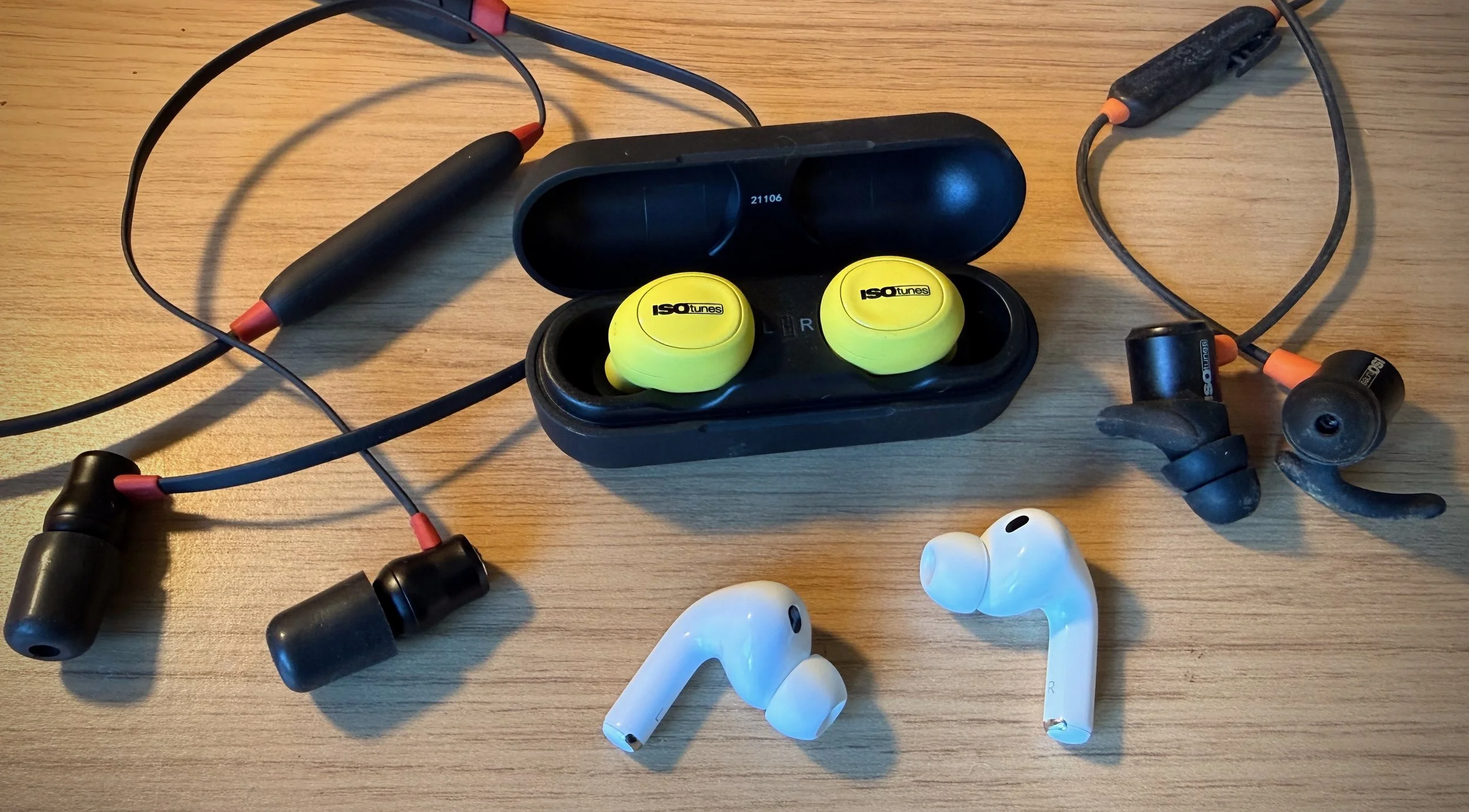 Image of ISOTunes Xtra, ISOTunes Free and ISOTunes Pro hearing protection, and AirPods Pro 3