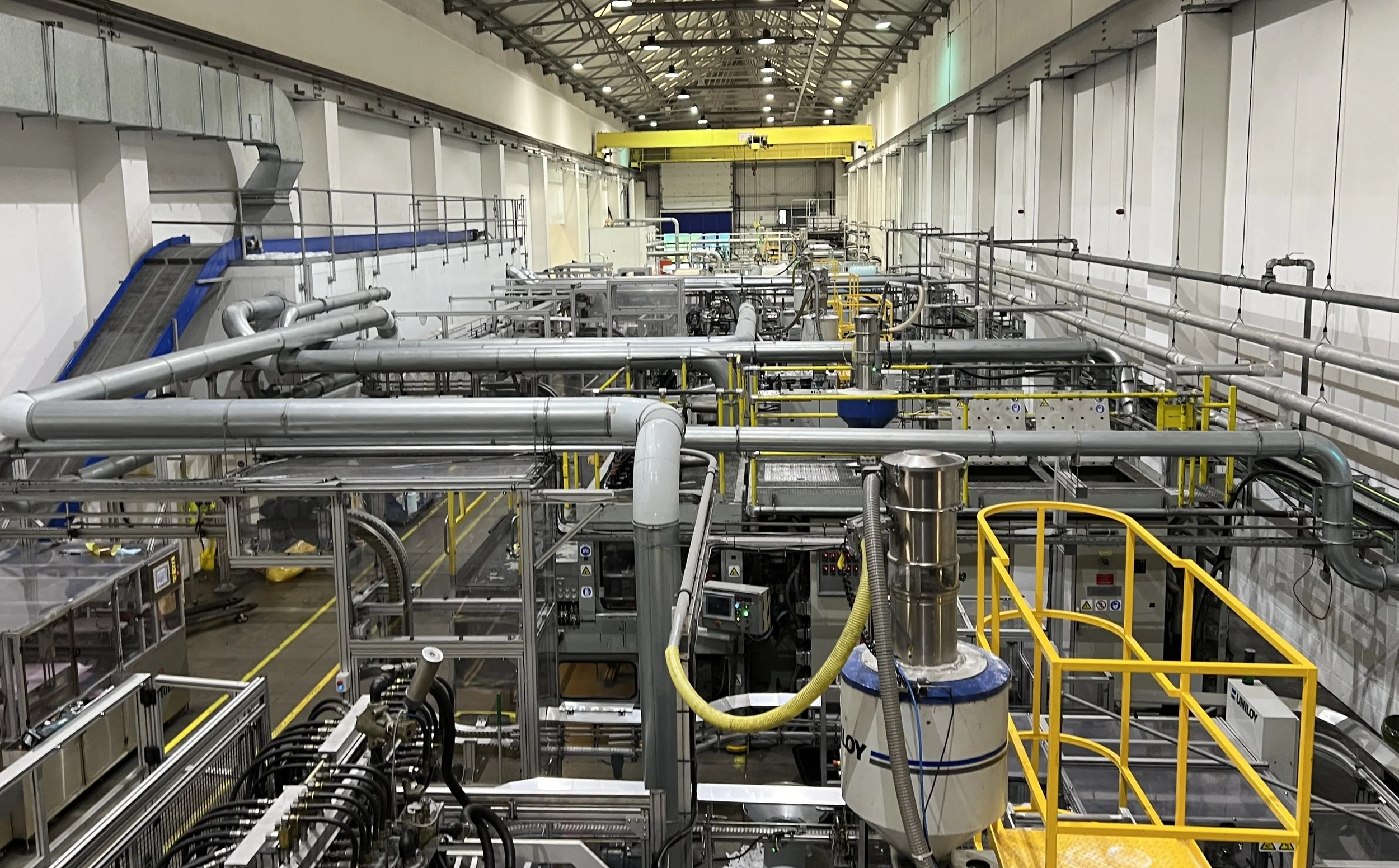 Large bottling factory noise assessment showing a maze of pipes.