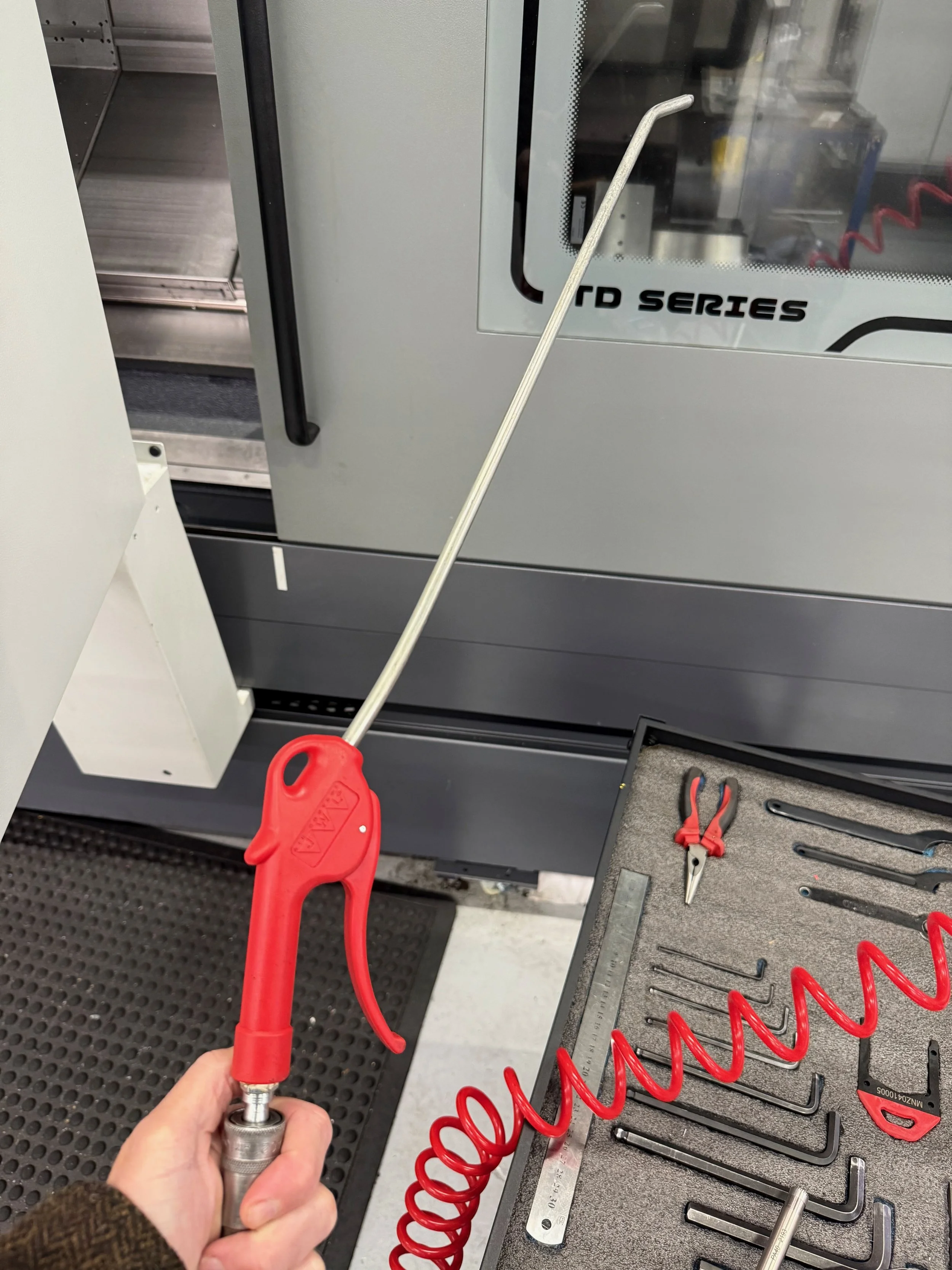 Air gun handle with a long nozzle