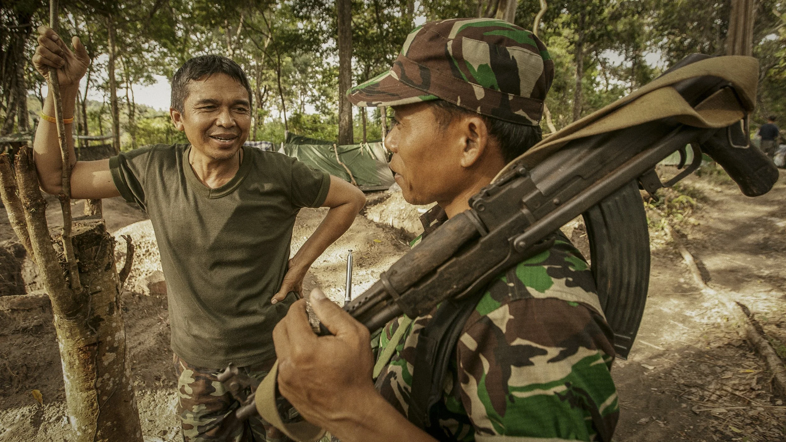 These Cambodian soldiers in conversation, updating each other with the day’s events along the newly constructed trench lines.